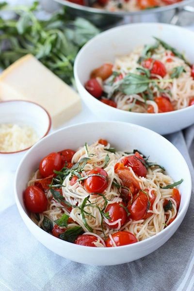 Order Cherry Tomato and Basil Angel Hair Pasta with Garlic Bread food online from The Spice Of Life Catering store, Carrollton on bringmethat.com