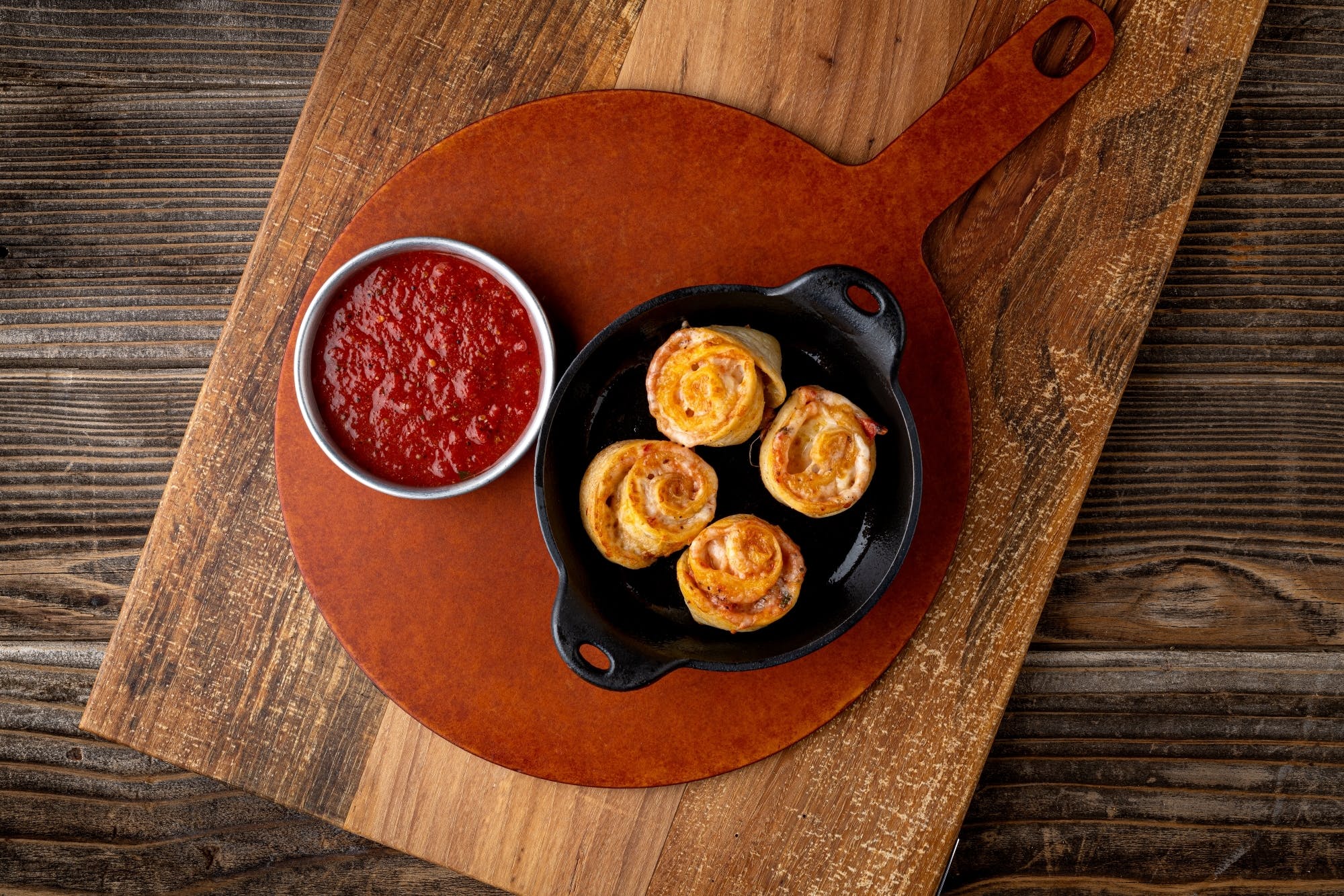 Order Garlic Creamy Tomato Rotoli - 2 Pieces food online from Fired Pie store, Glendale on bringmethat.com