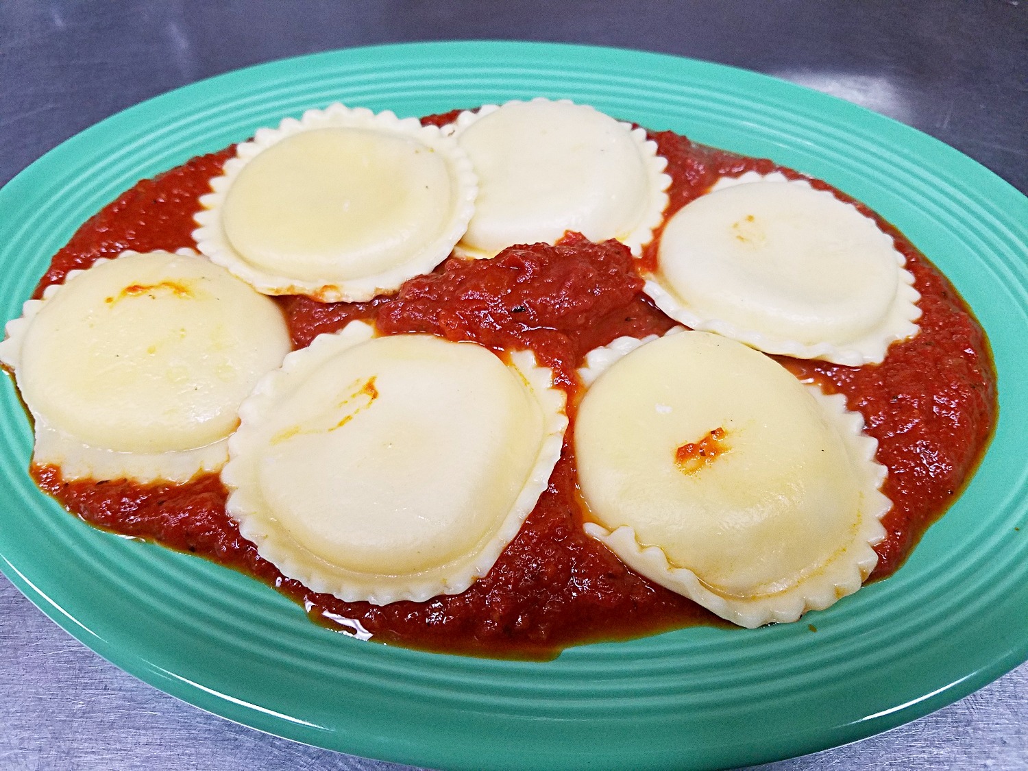 Order Jumbo Cheese Ravioli with Marinara Sauce food online from Numero Uno Pizza store, Lawndale on bringmethat.com