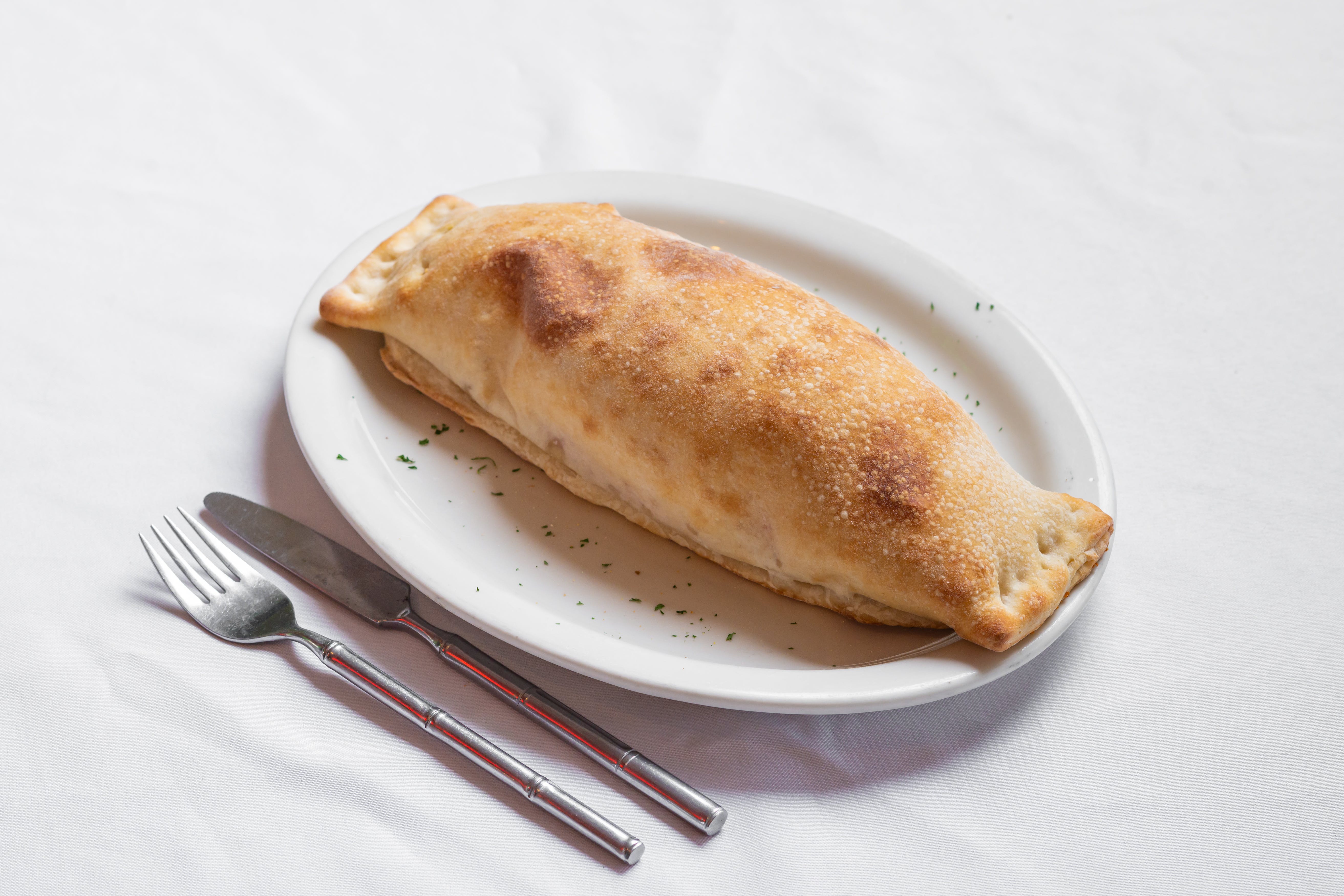 Order Stromboli Roll - Regular food online from Uncle Sal Pizza Ii store, Sparta Township on bringmethat.com