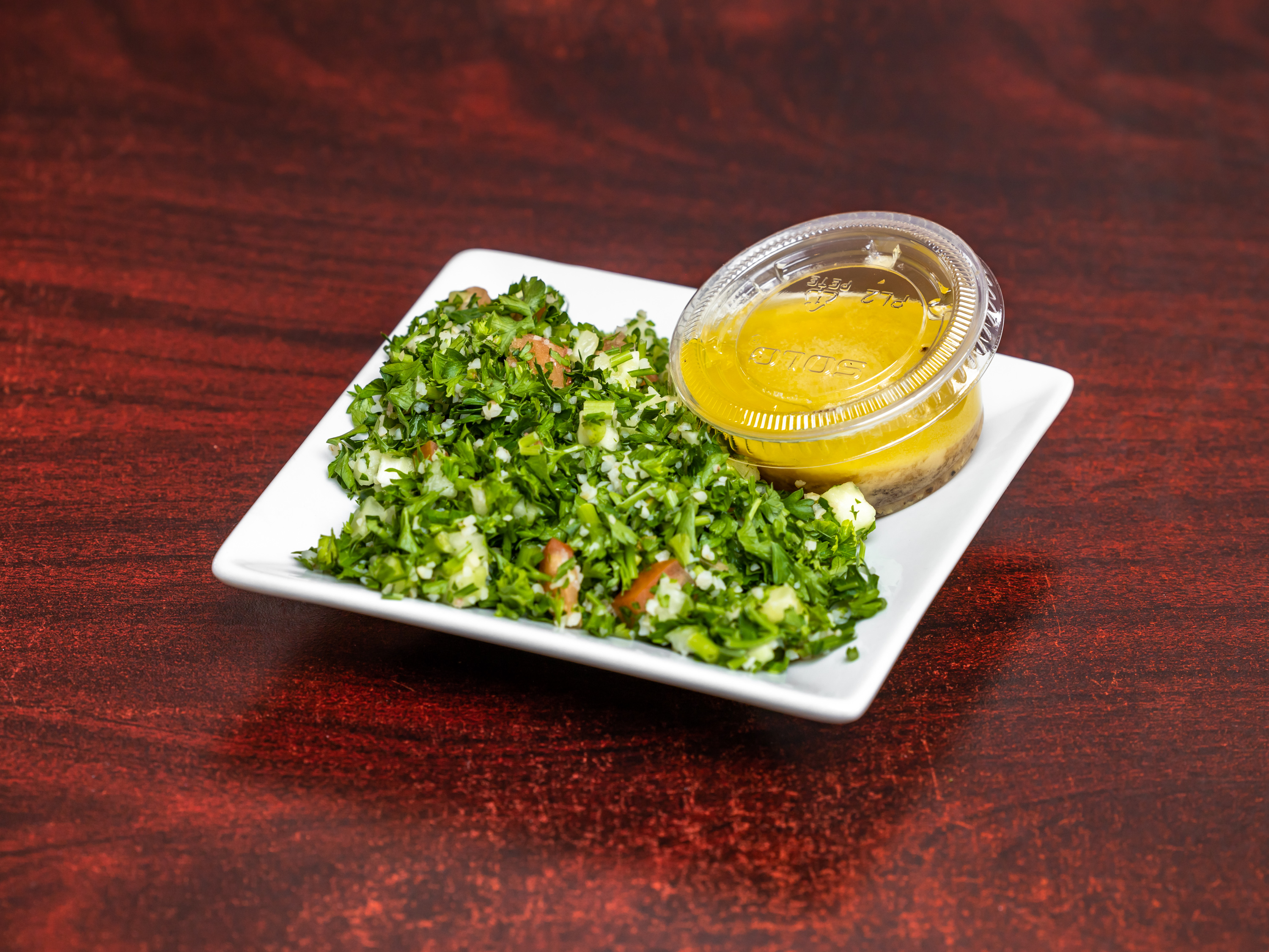 Order Tabouli Salad food online from Strawberry Fields store, Urbana on bringmethat.com