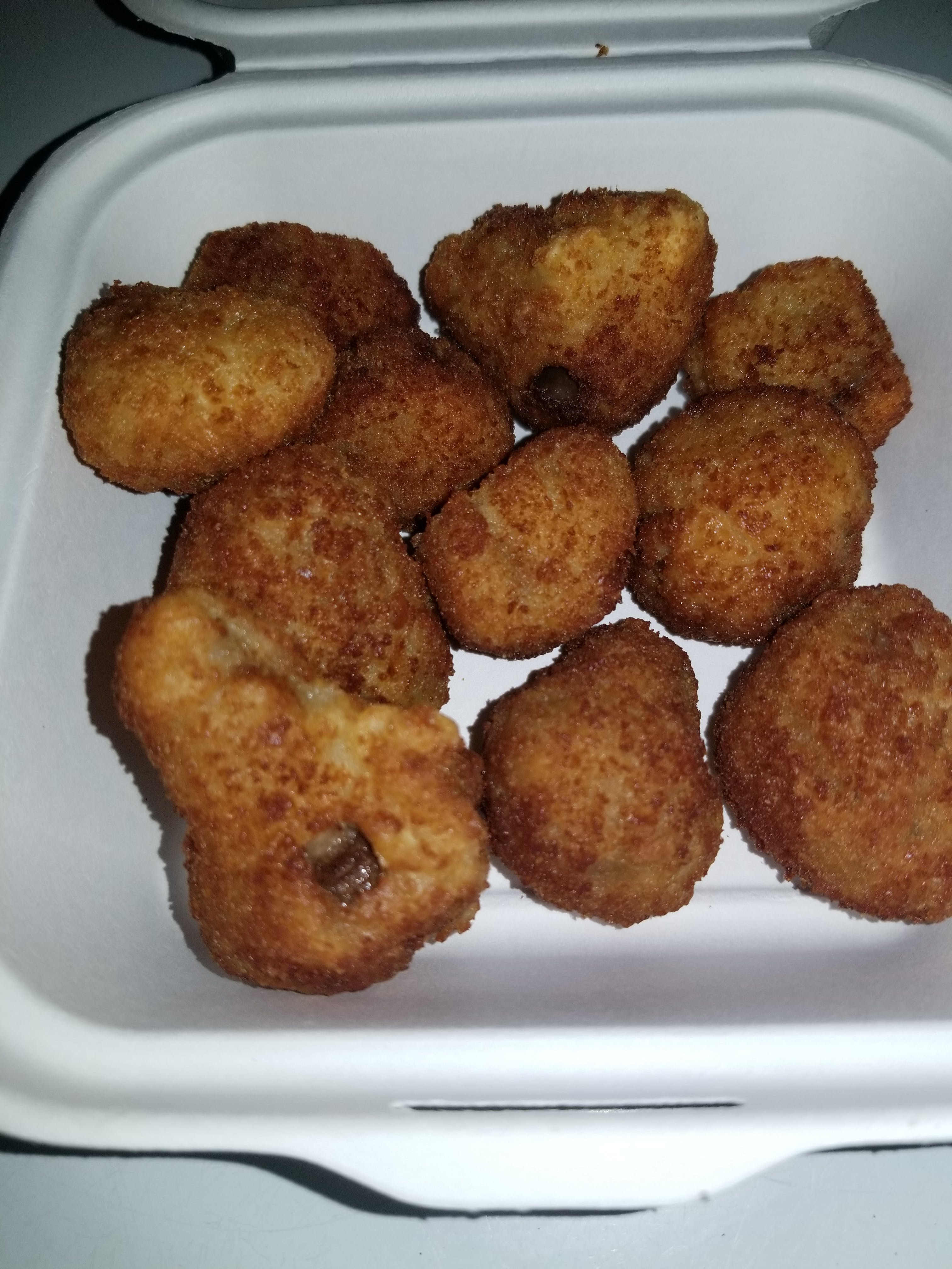 Order Breaded Mushrooms - Side food online from Novotny's Groceries & Pizza store, Worthington on bringmethat.com