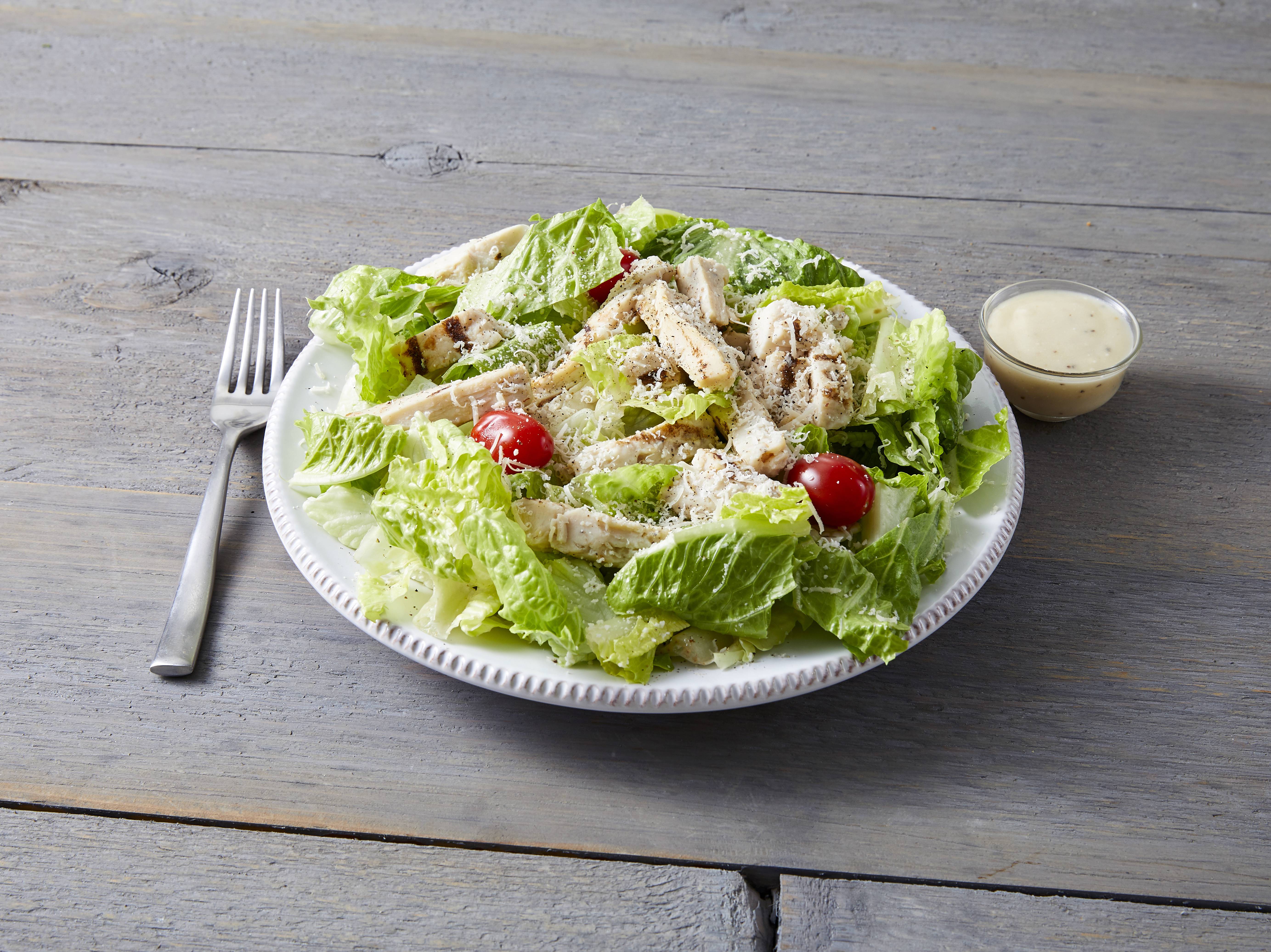 Order Grilled Chicken Caesar Salad food online from Benito's Pizza store, Royal Oak on bringmethat.com