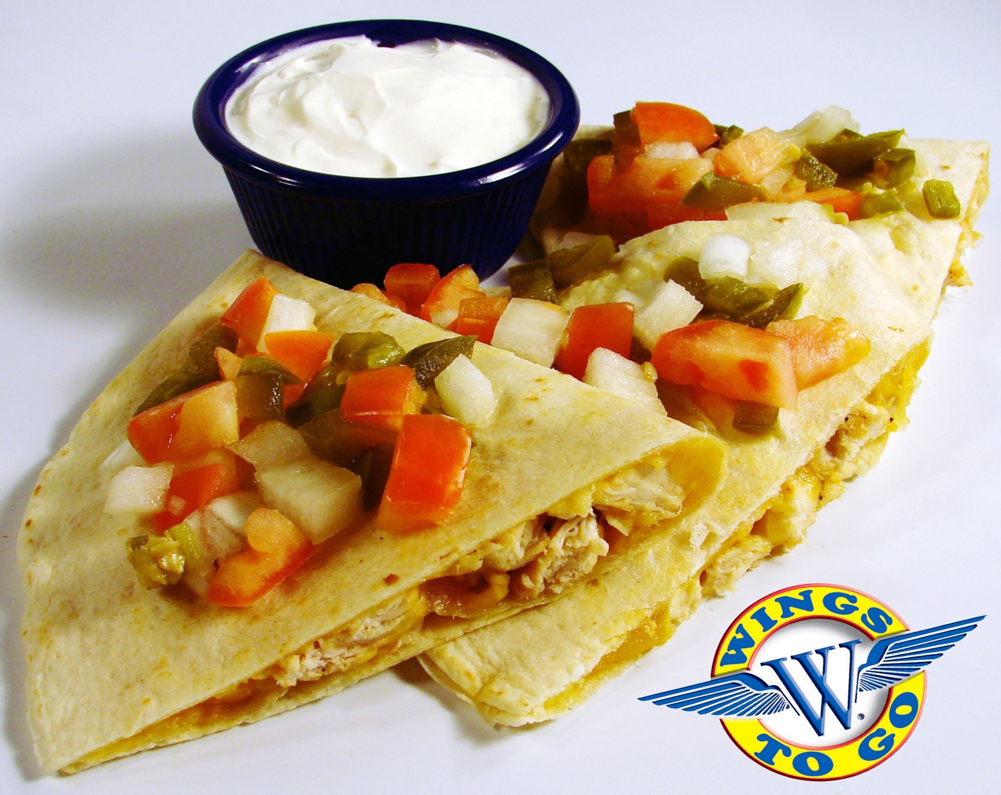 Order Chicken and Cheese Quesadilla food online from Wings to Go store, West Chester on bringmethat.com