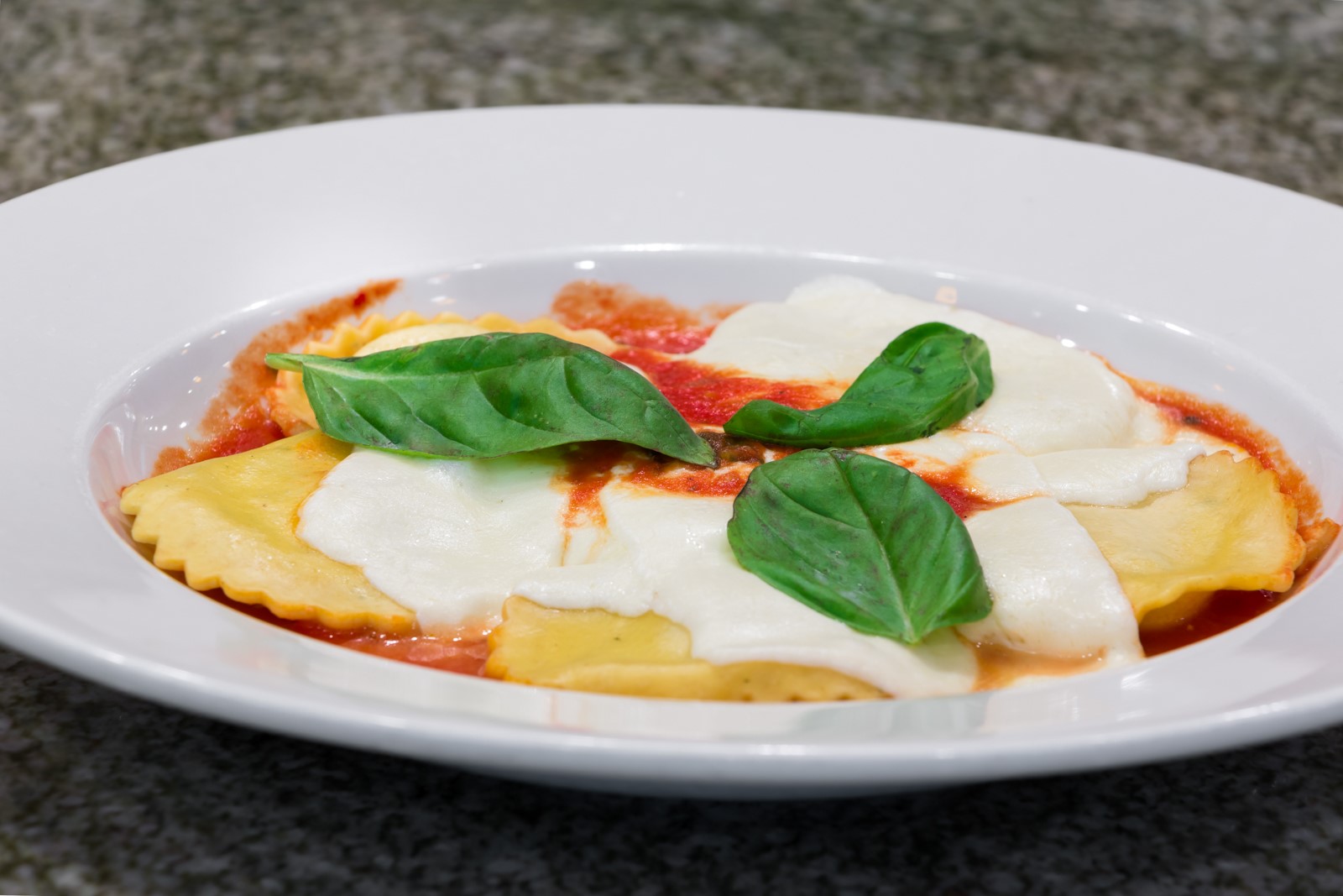 Order Ravioli al Forno food online from Andrew's Coffee Shop store, New York on bringmethat.com