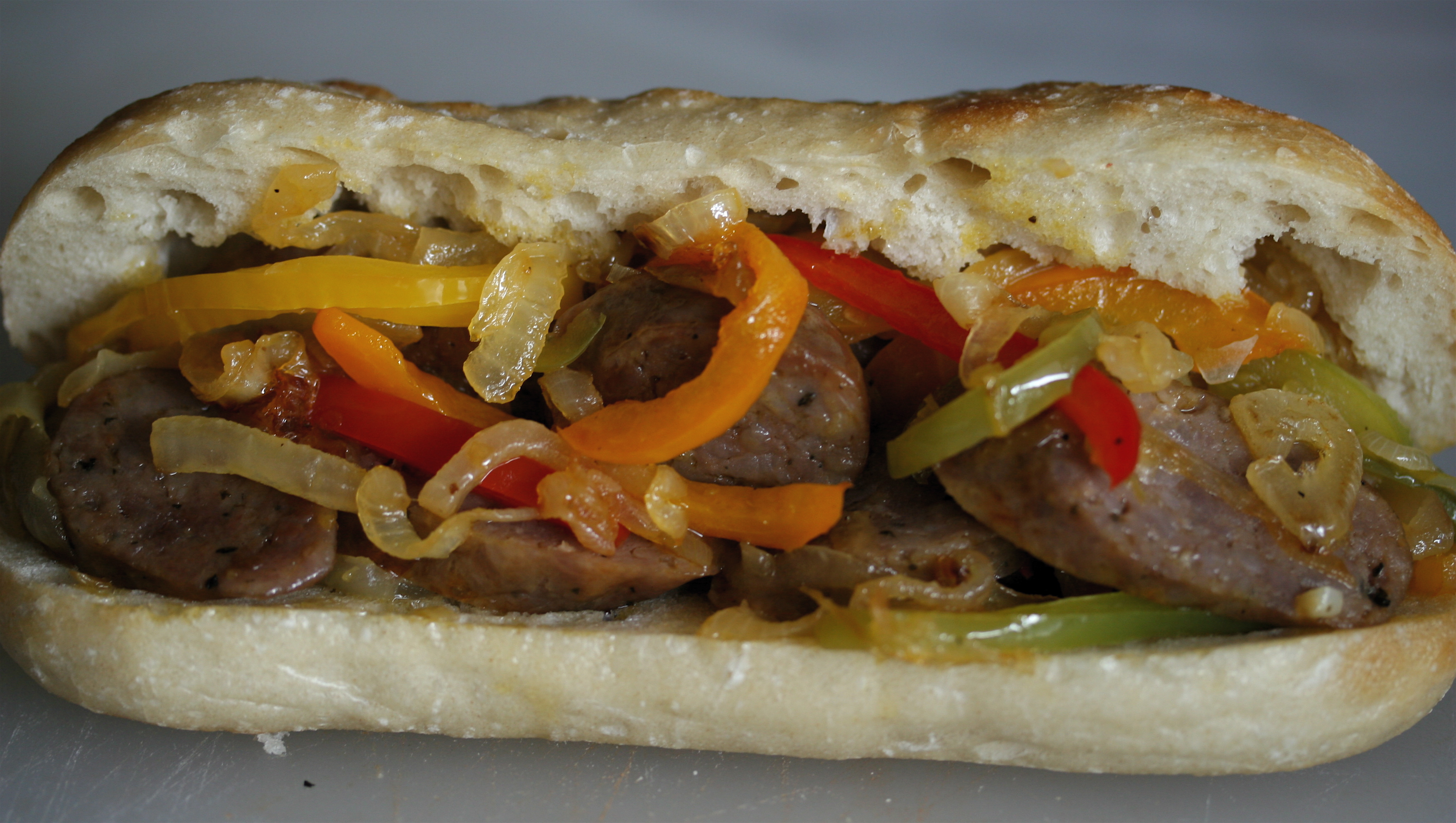 Order Sausage and Peppers Sandwich food online from Pedone Pizza store, Hermosa Beach on bringmethat.com