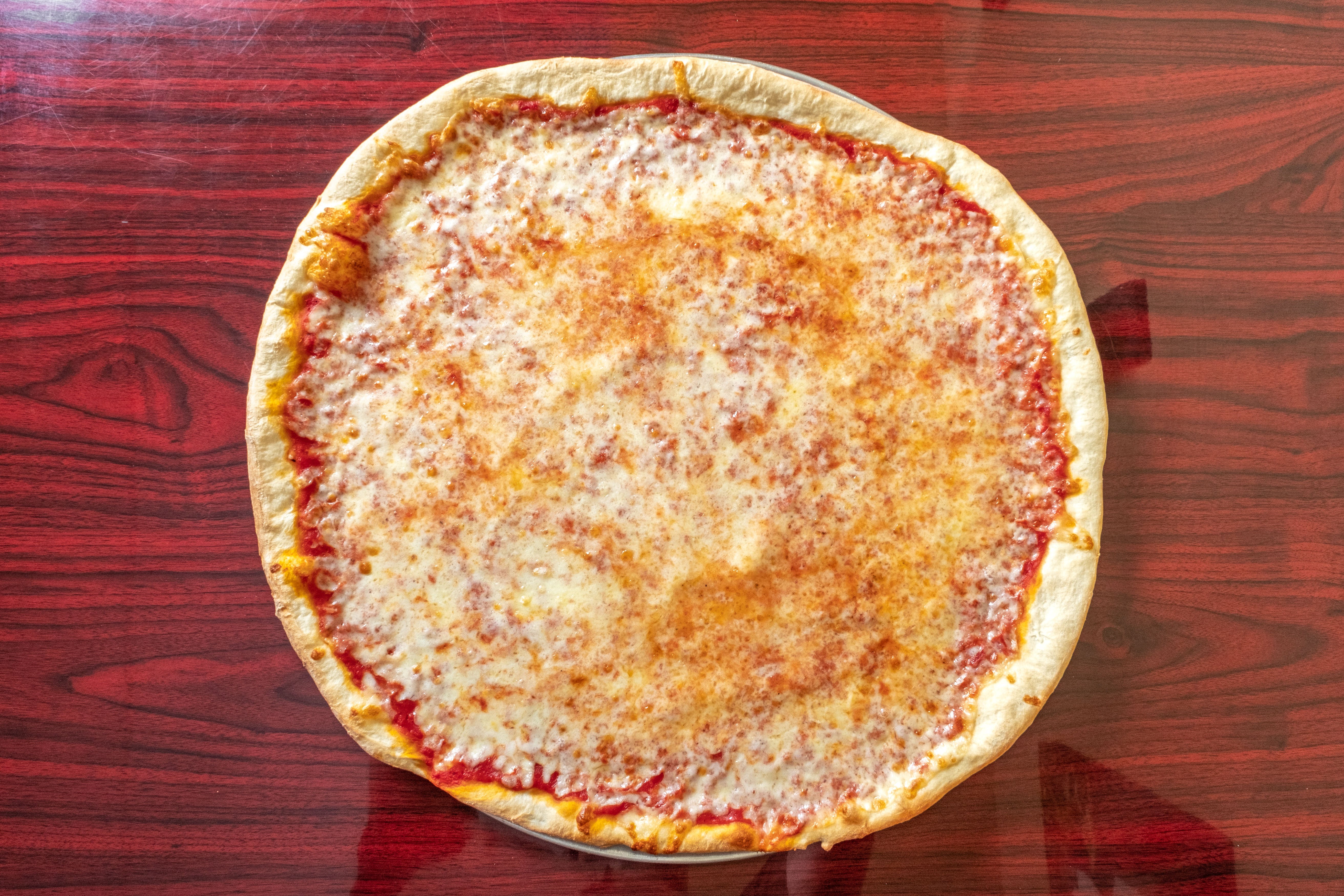 Order Plain Cheese Pizza - Small 12" food online from Giovanni Pizzeria & Italian Restaurant store, Holland on bringmethat.com