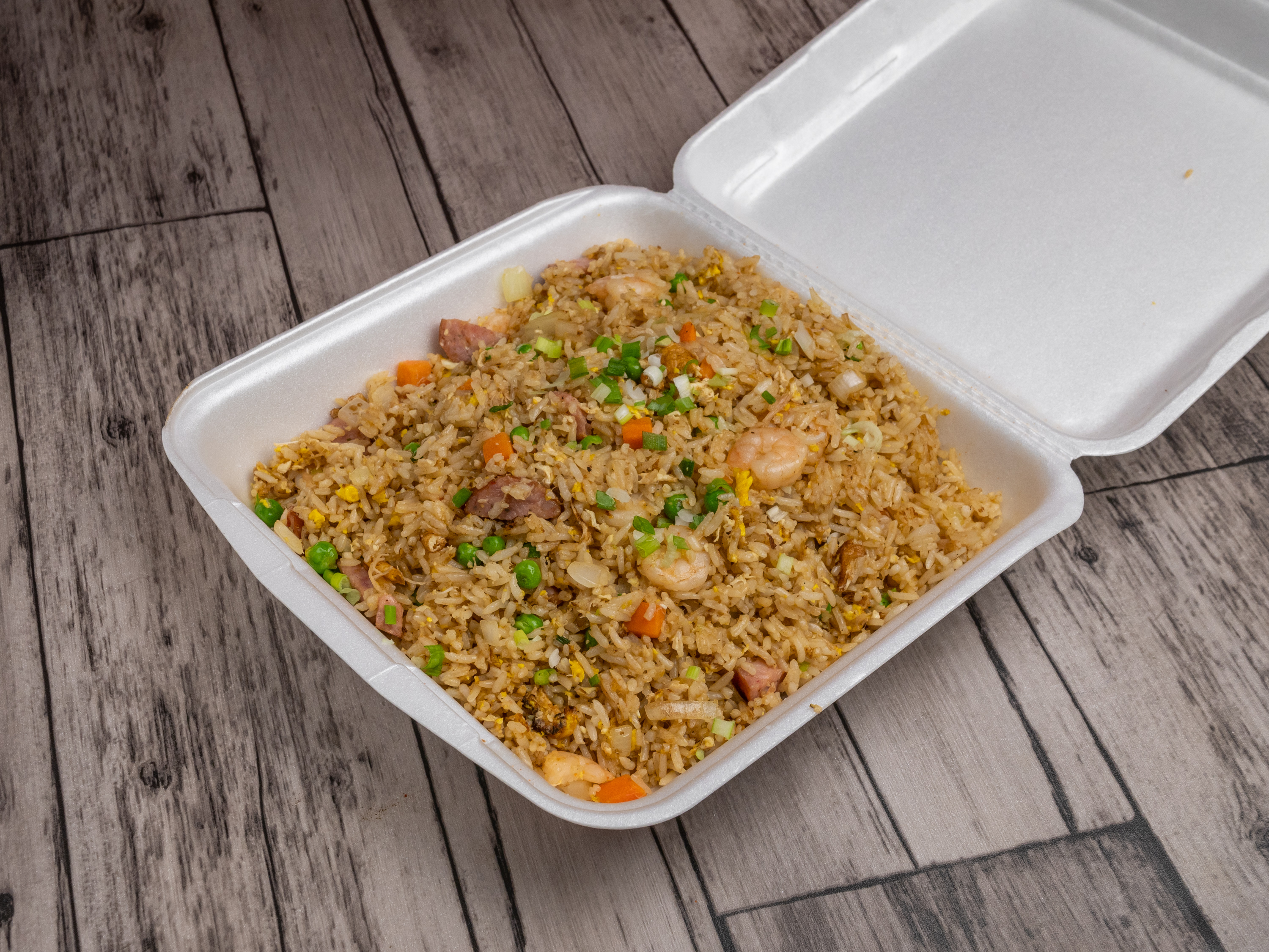 Order La Fried Rice food online from La Cajun Crawfish store, Houston on bringmethat.com