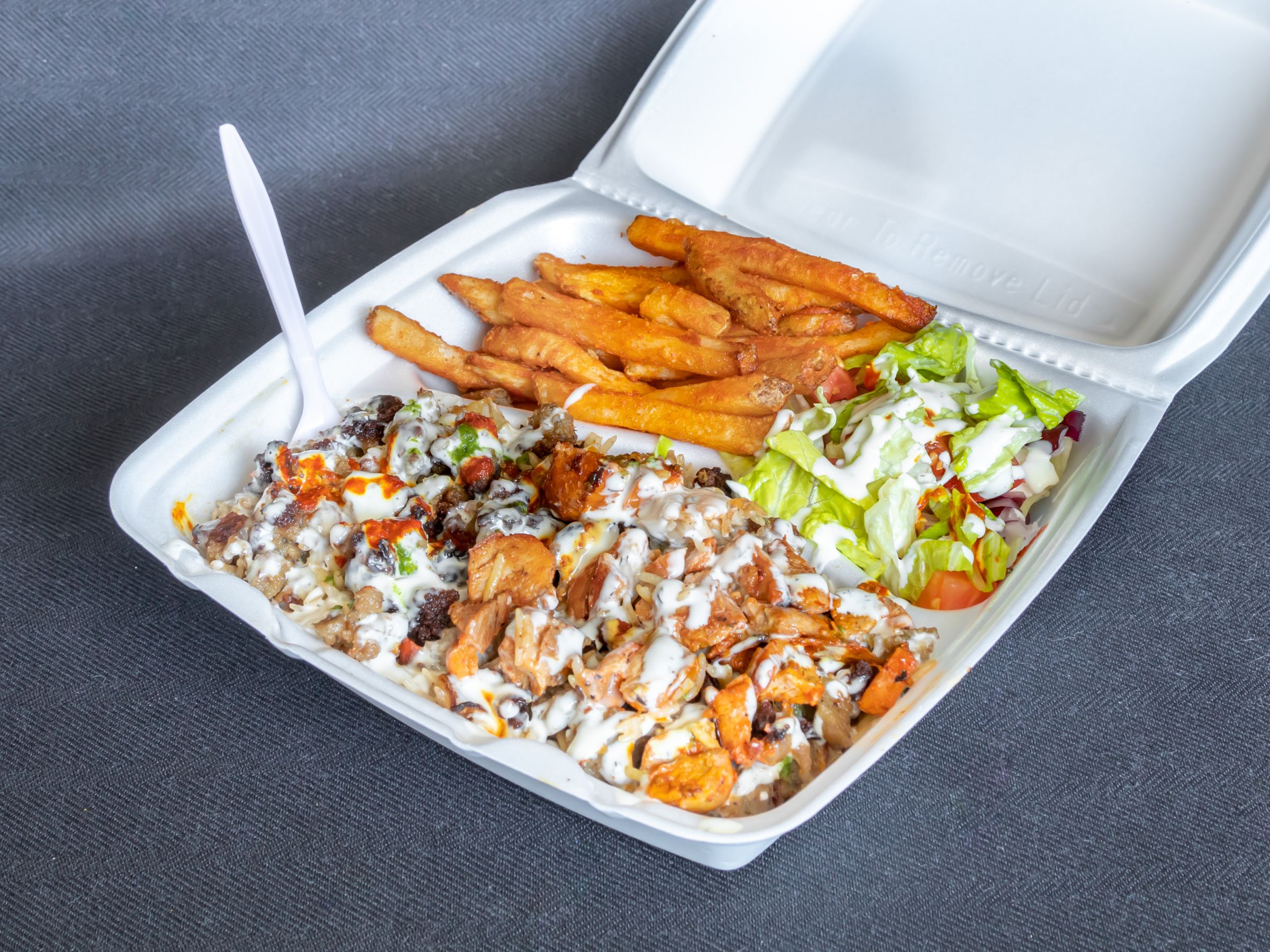 Order Combo Chicken and Lamb Over Rice Platter food online from Taqwa Food Mart store, Bensalem on bringmethat.com