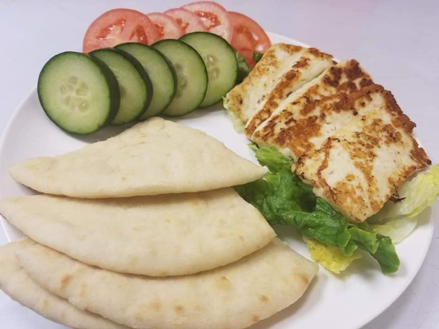 Order Imported Halloumi Cheese Plate food online from Aladdin Mediterranean Cuisine store, New Albany on bringmethat.com