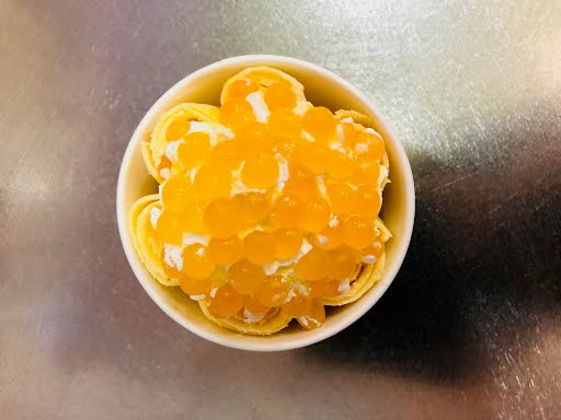 Order Pop N' Roll Mango Rolled Ice Cream food online from Touhy Fruity store, Norridge on bringmethat.com