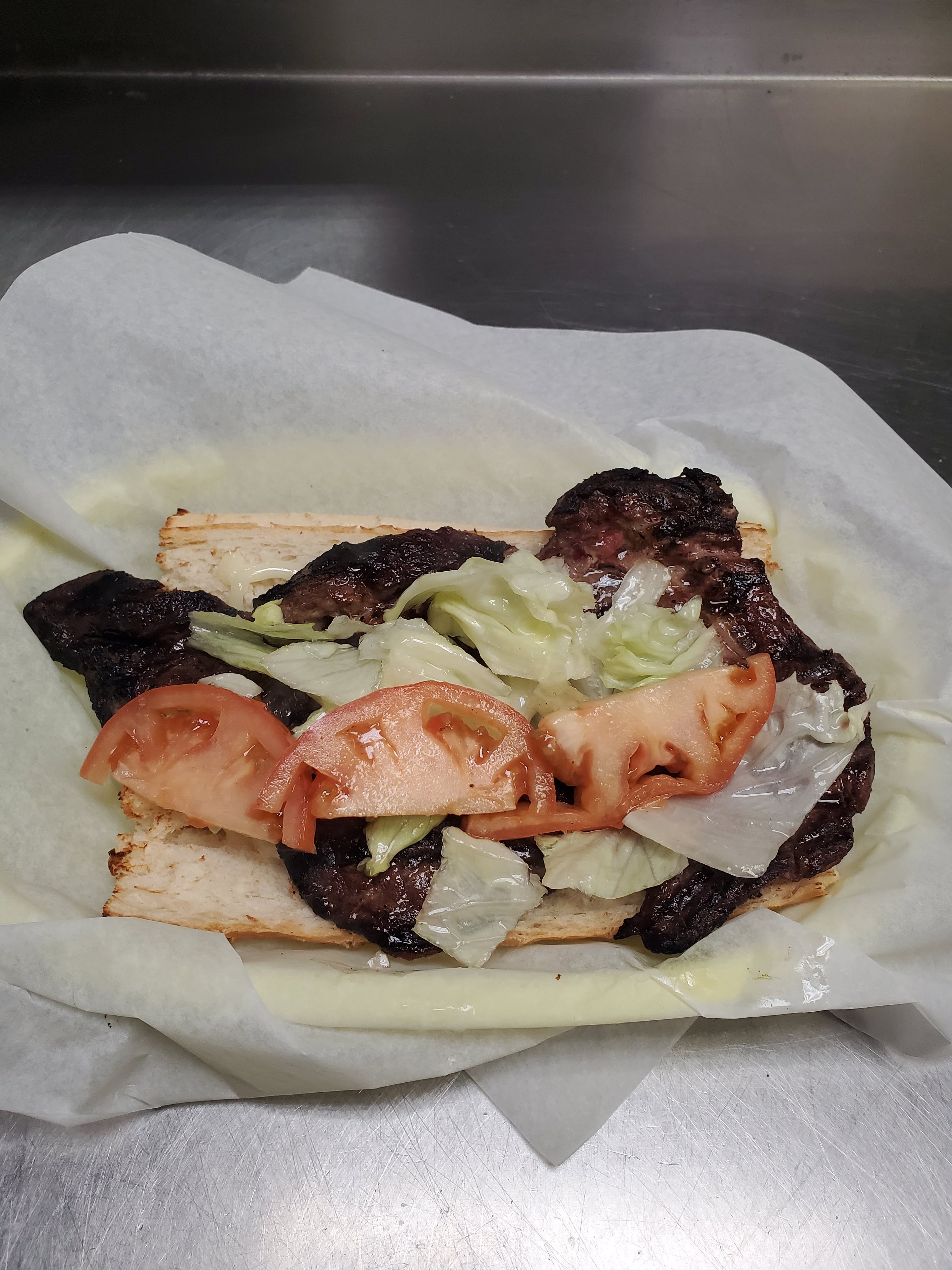 Order Grilled Steak Sandwich - Sandwich food online from Pizza Cucina store, Oswego on bringmethat.com