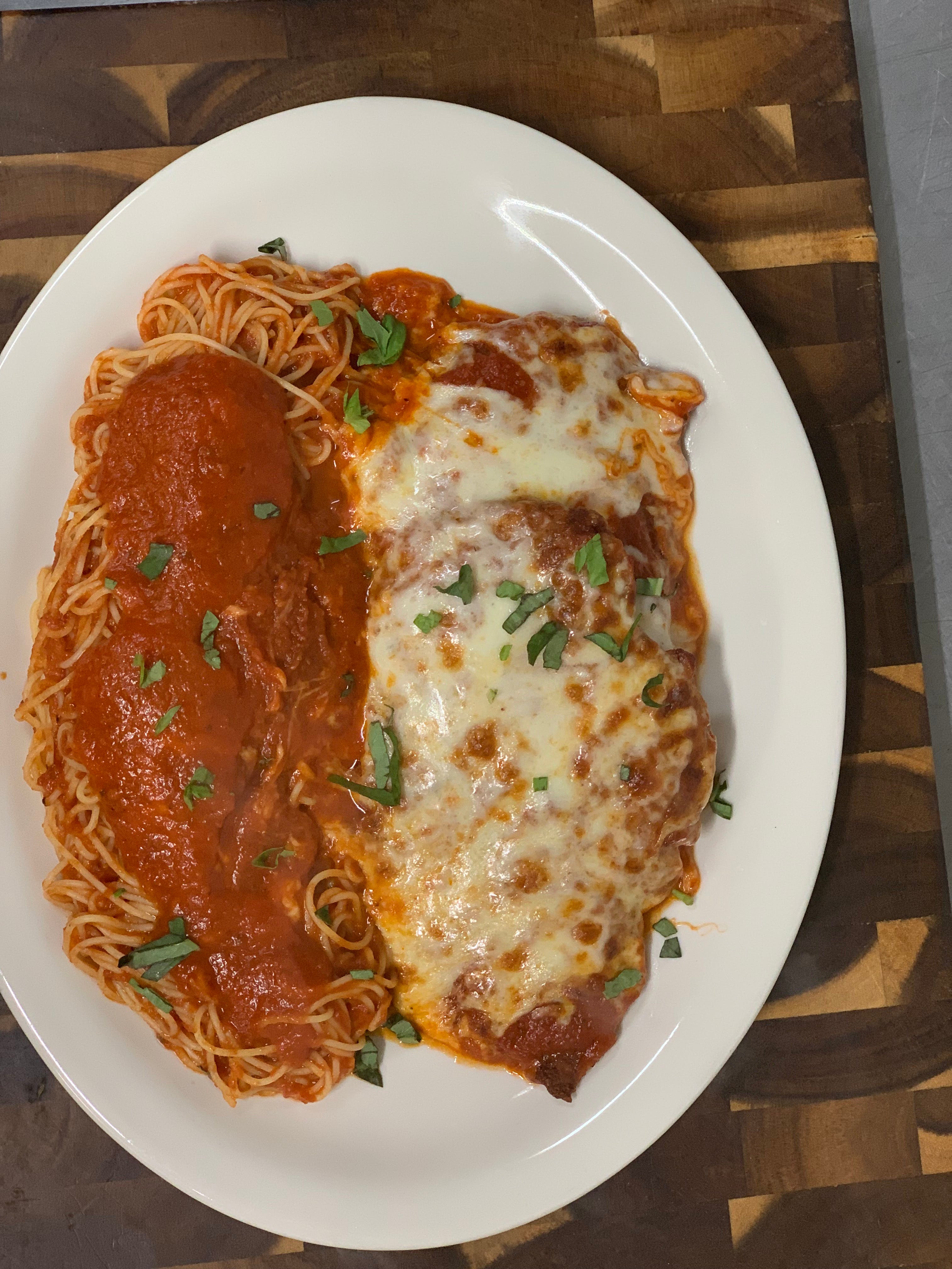 Order Chicken Parmigiana - Chicken Dinners food online from Fratelli's Italian Pizza & Family Restaurant store, Conyngham on bringmethat.com