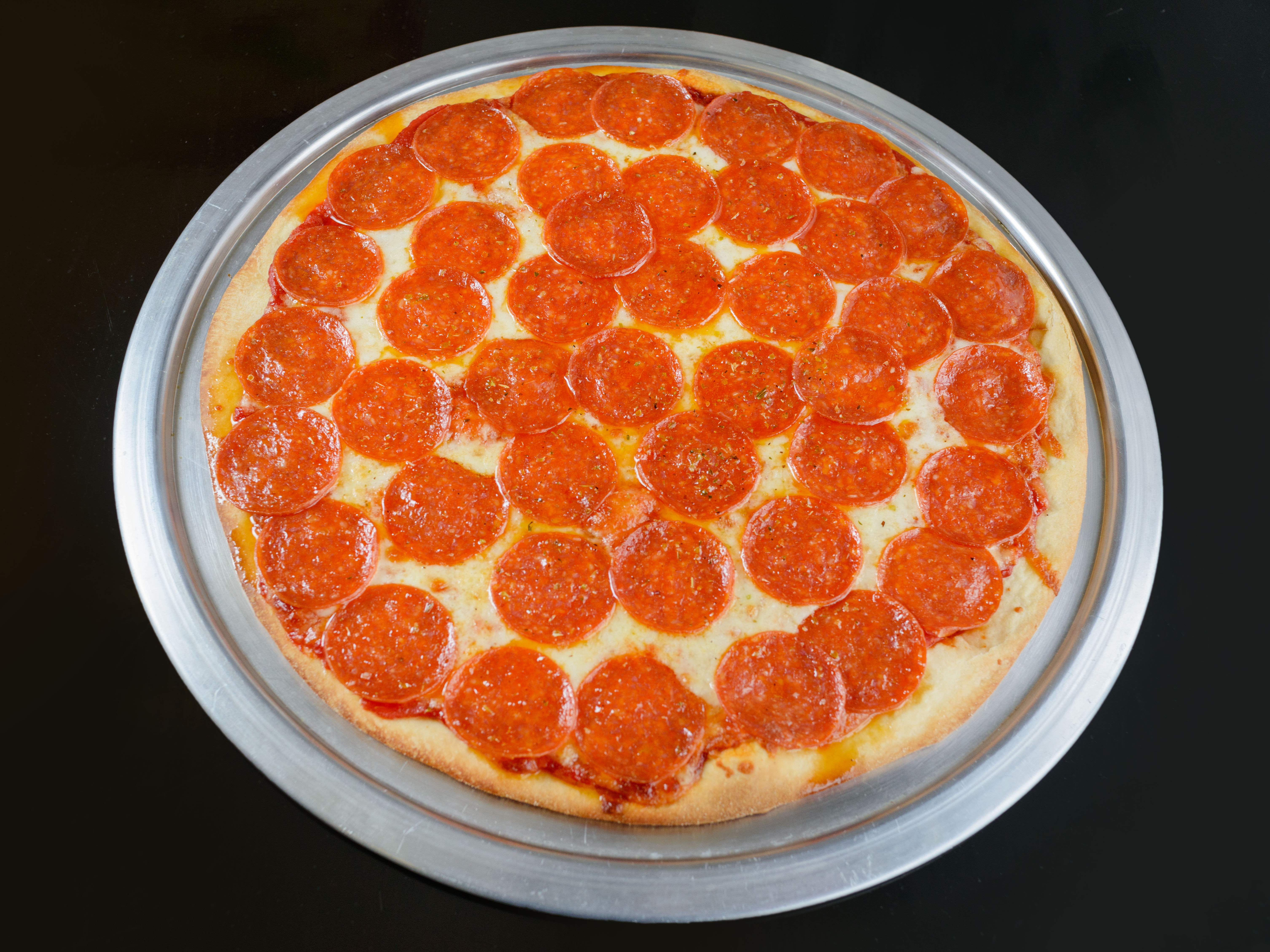 Order Create Your Own Pizza (12") food online from Penguino's Pizza store, Buffalo Grove on bringmethat.com