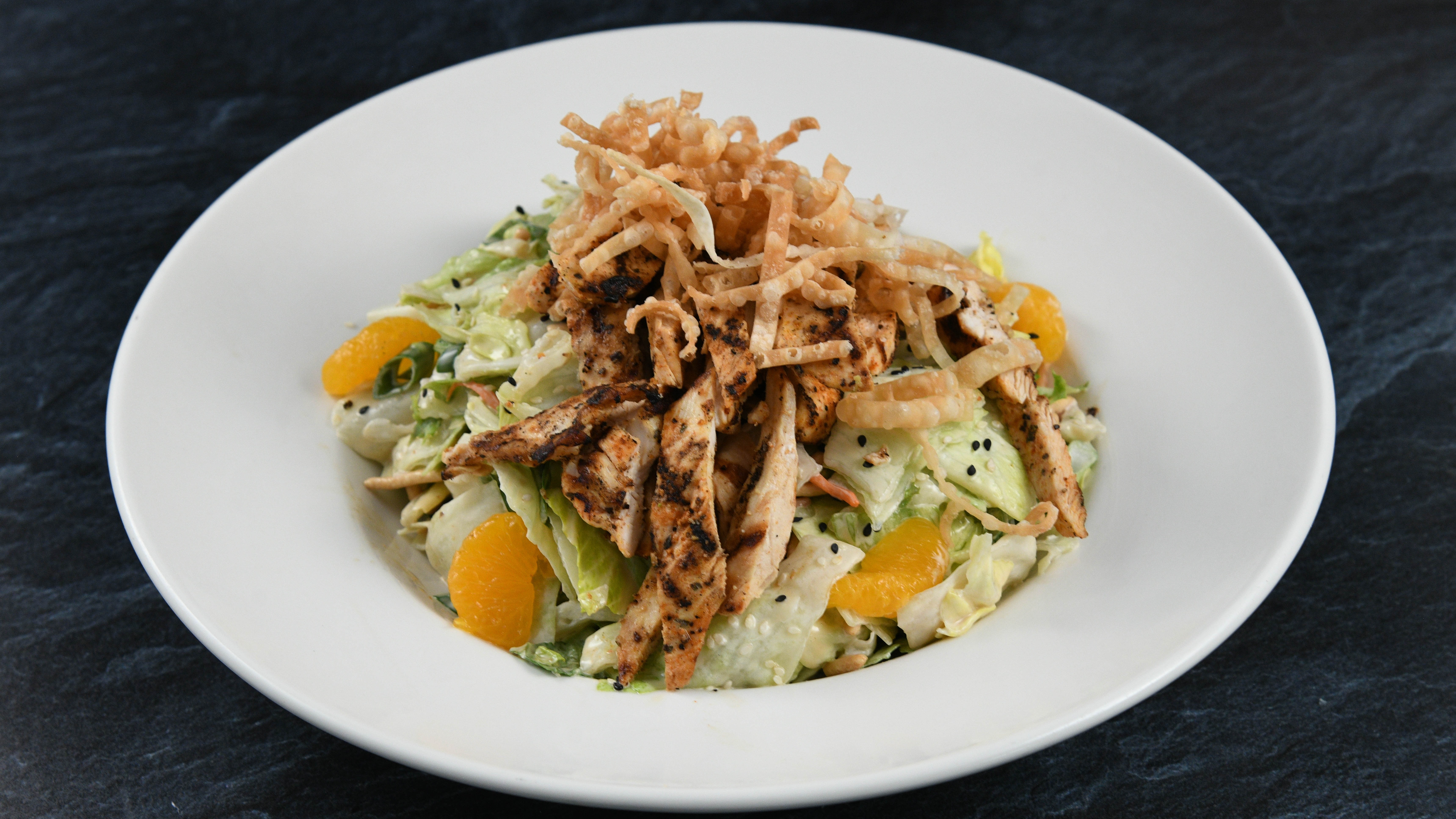 Order China Island Chicken Salad food online from Rainforest Cafe store, Atlantic City on bringmethat.com