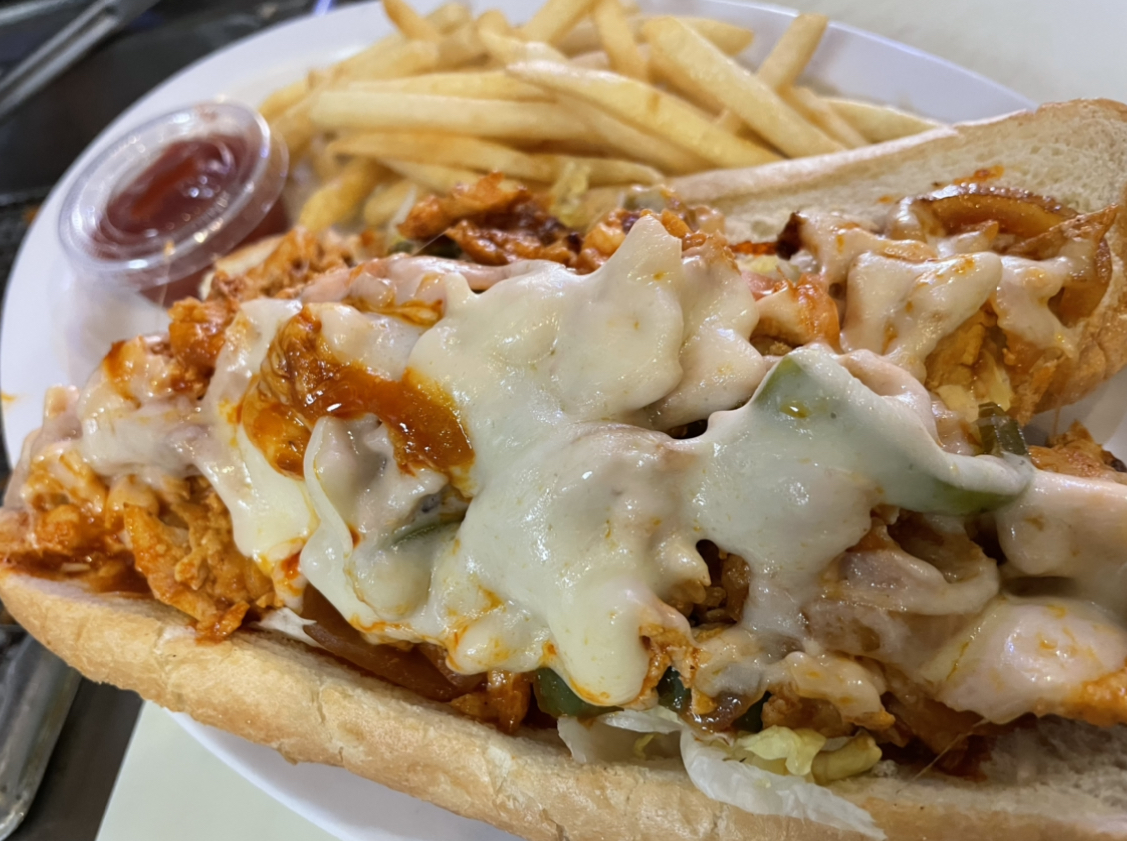 Order Chicken Buffalo (with spicy sauce) with fries food online from Apong's Philly Steak store, Rancho Mirage on bringmethat.com