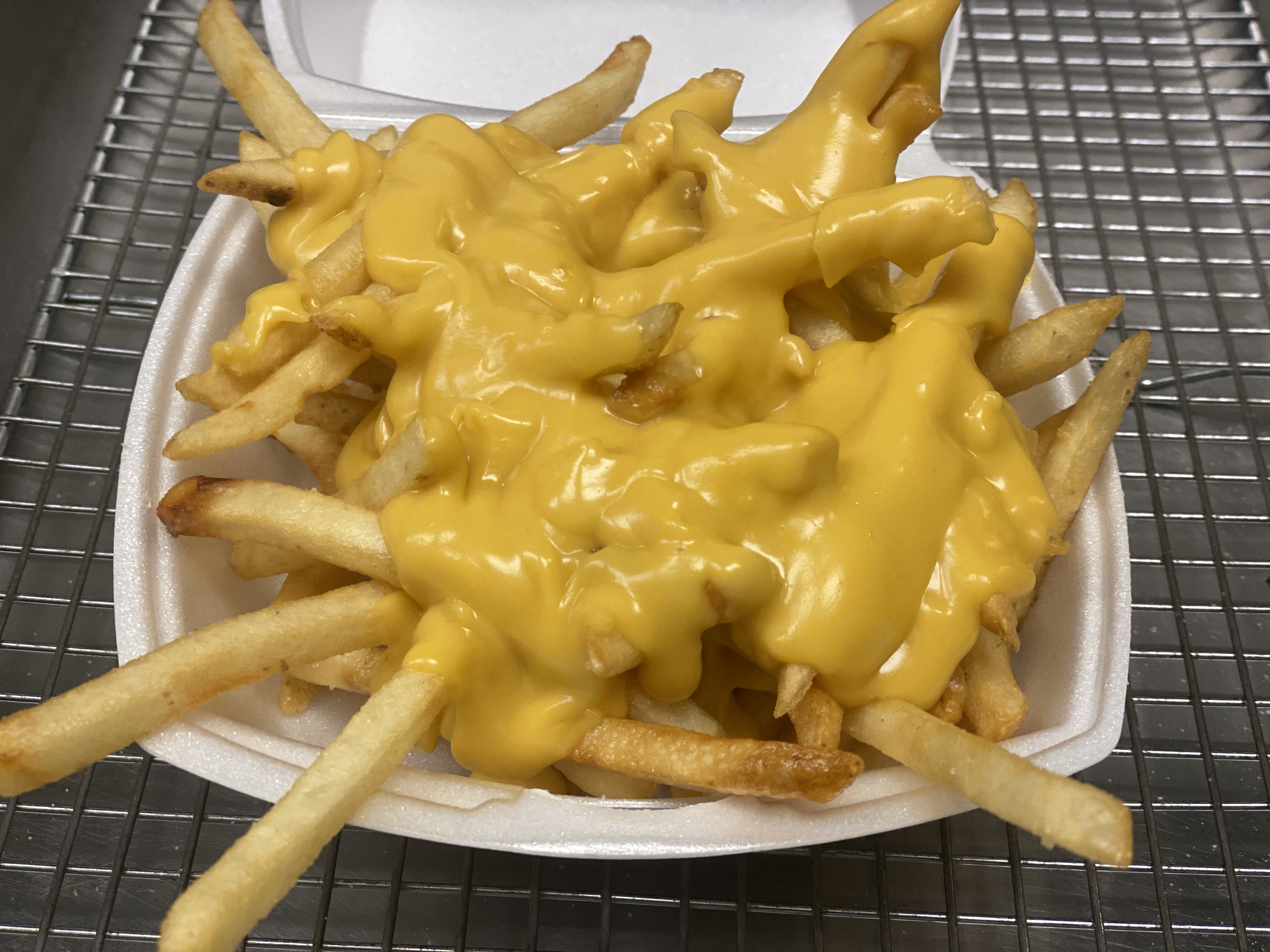 Order Cheese Fries food online from Lil Burgers store, Nutley on bringmethat.com