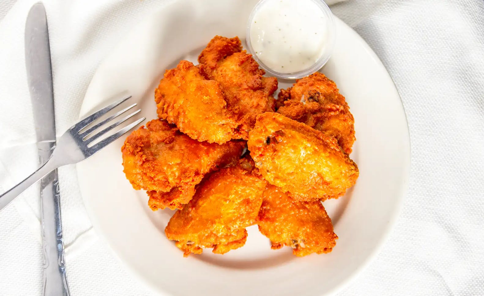 Order Breaded Hot Wings - 6 Pieces food online from Friendly Tavern store, St Marys on bringmethat.com