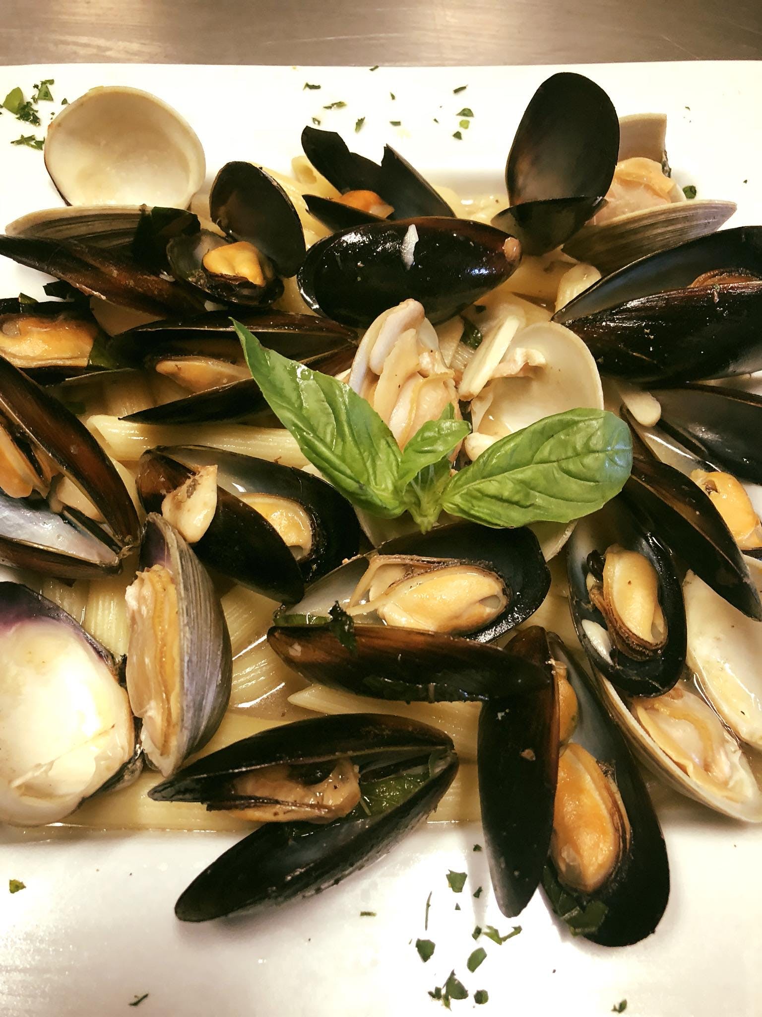Order Mussels & Clams Combination Catering - Half Tray (Serves 10-12 People) food online from Linda's Pizza & Restaurant store, Manchester Township on bringmethat.com
