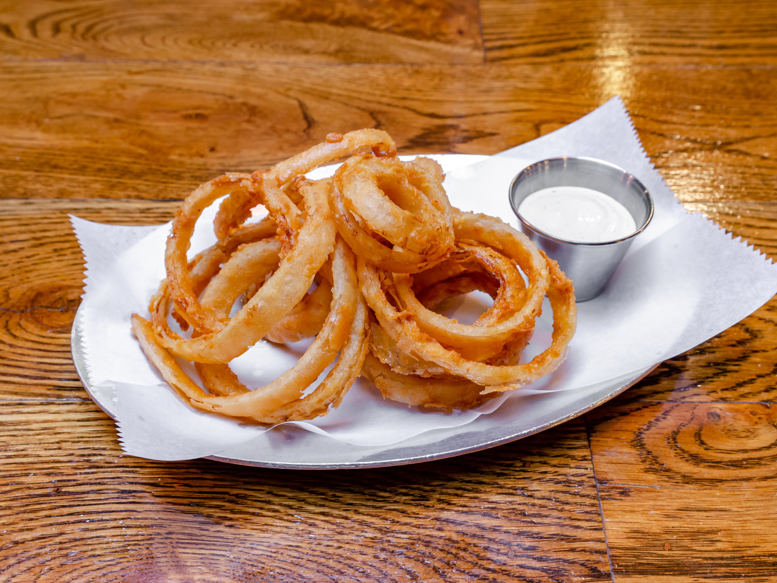 Order Onion Rings food online from Black Iron Burger store, New York on bringmethat.com