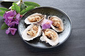 Order Garlic Oyster food online from Kumo Sushi store, Plainview on bringmethat.com