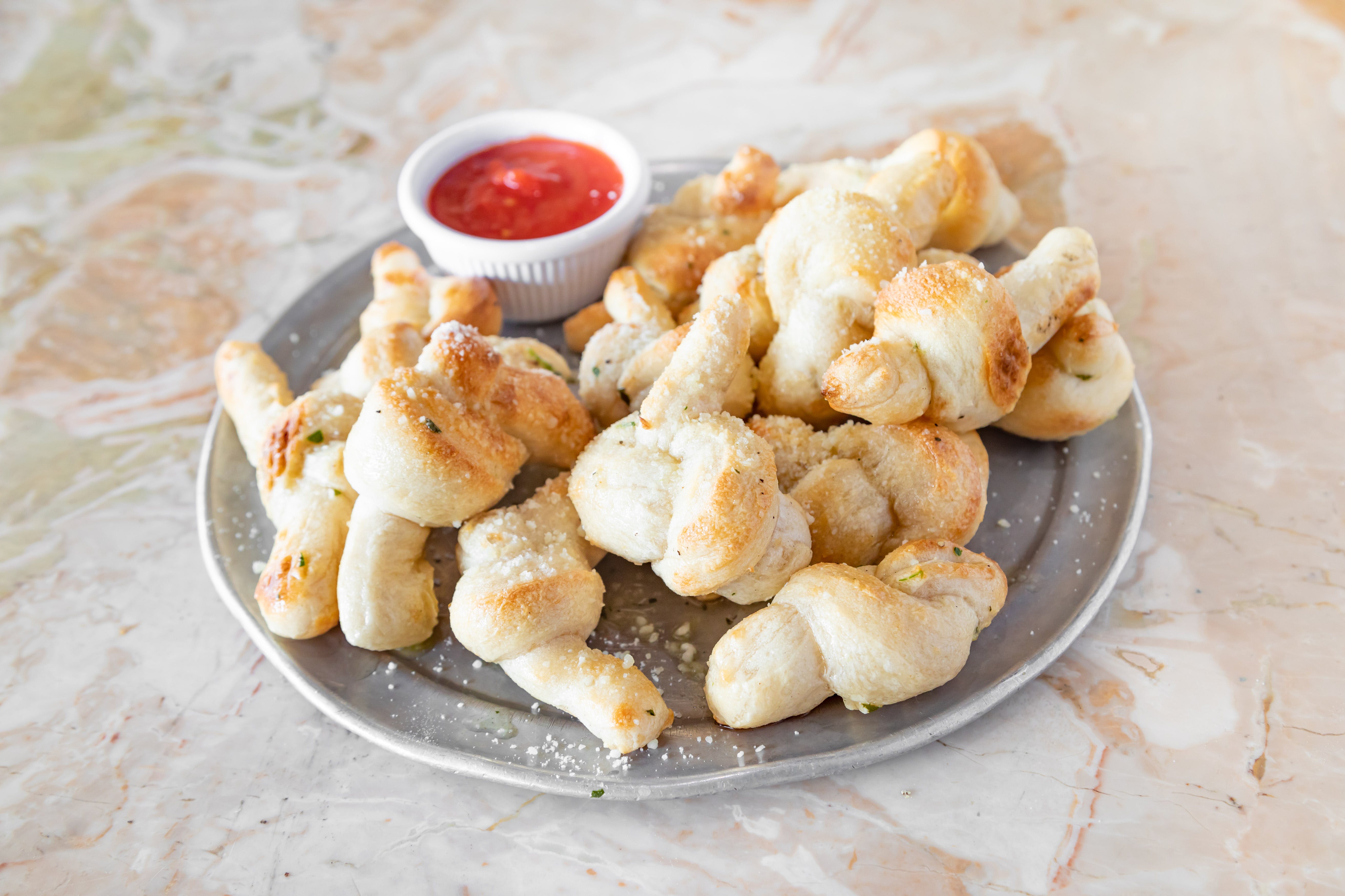 Order Garlic Knots - Small food online from Lisa Luna Pizza store, Simsbury on bringmethat.com