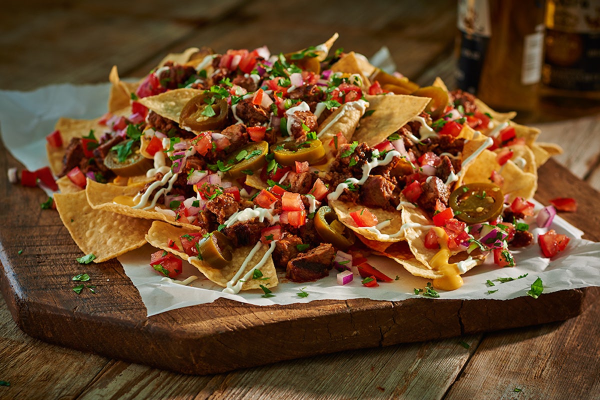 Order Steakhouse Nachos food online from Black Angus Steakhouse store, Fountain Valley on bringmethat.com