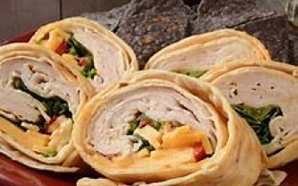 Order Turkey & Cheese Wrap - Wrap food online from Pino's Pizzeria store, Easton on bringmethat.com