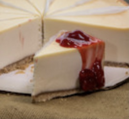 Order Slice of Cheesecake with Strawberry Topping food online from Madison's Pizza store, Albany on bringmethat.com