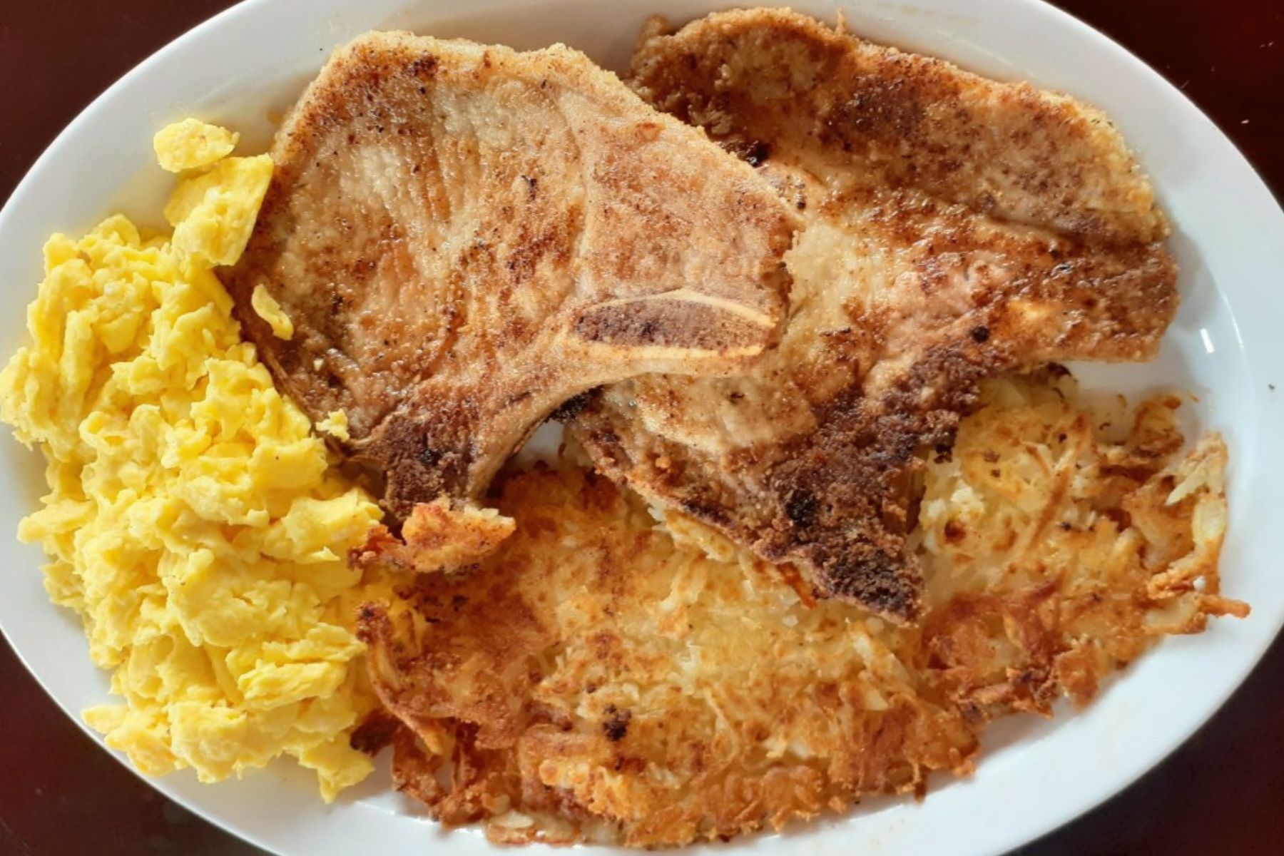 Order 2 Grilled Pork Chops & Eggs food online from Eat At Rudy store, Los Angeles on bringmethat.com