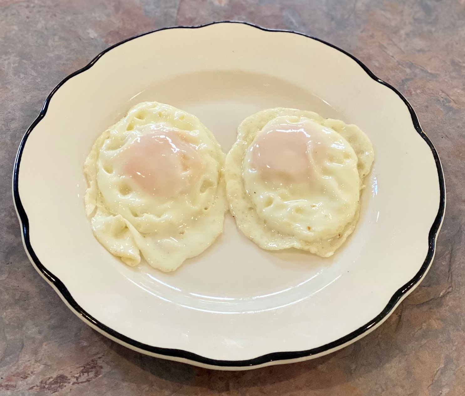 Order 2 Fried Eggs food online from Oliveiras Peabody store, Peabody on bringmethat.com