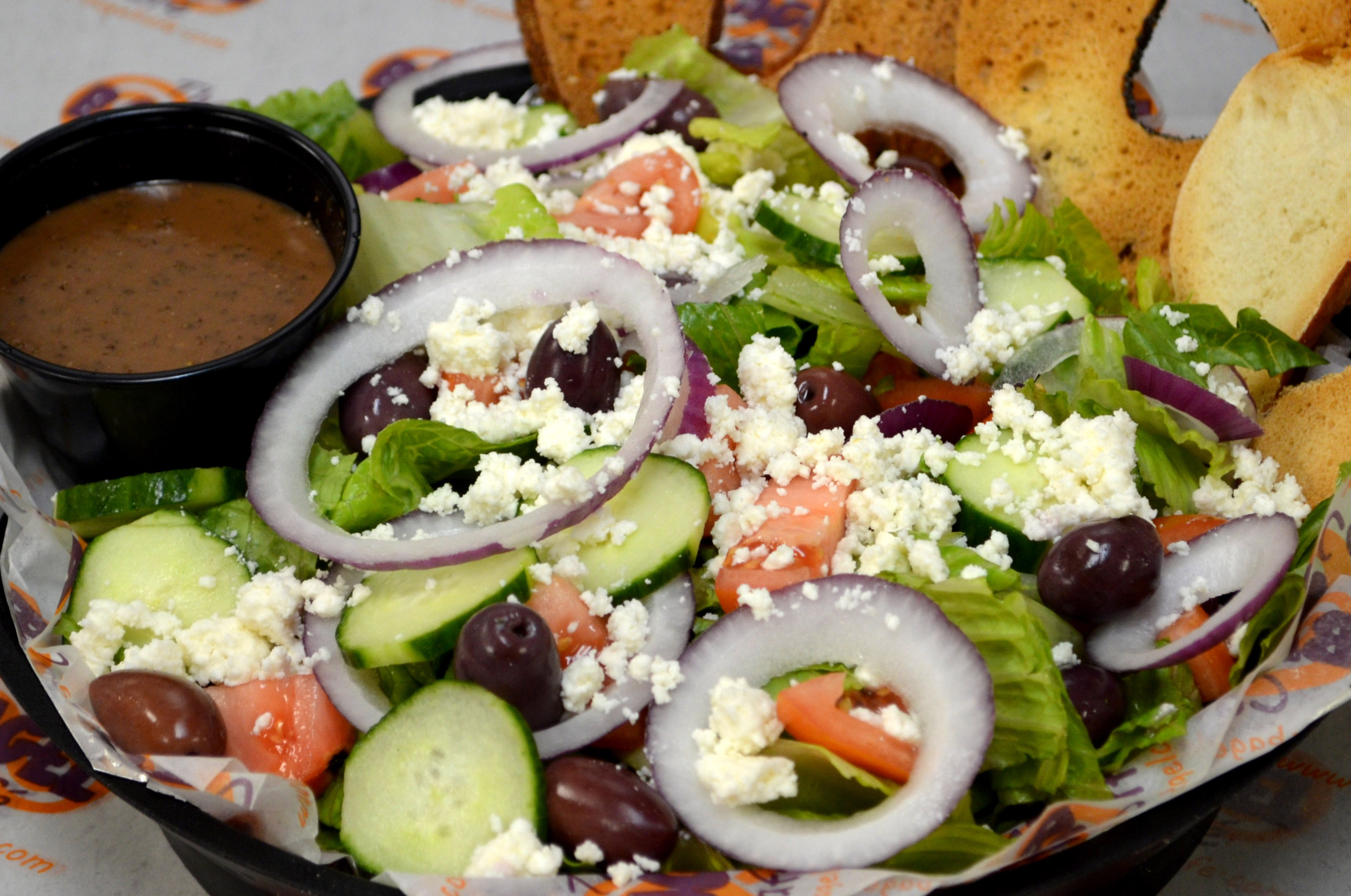 Order Greek Salad food online from Bagel Cafe store, Herndon on bringmethat.com