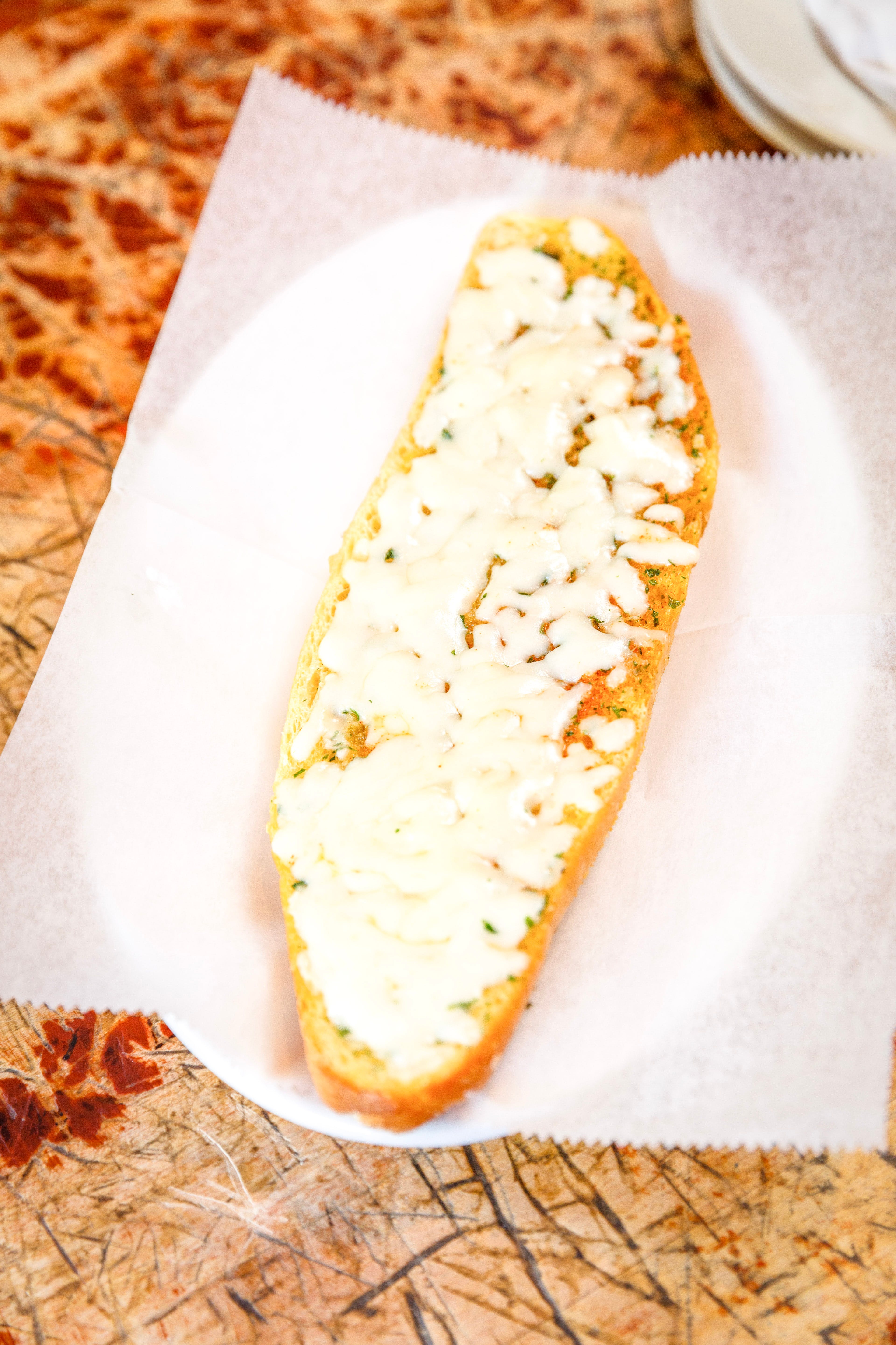 Order Garlic Bread with Mozzarella Cheese - Appetizer food online from John Of Bleecker Street store, New York on bringmethat.com
