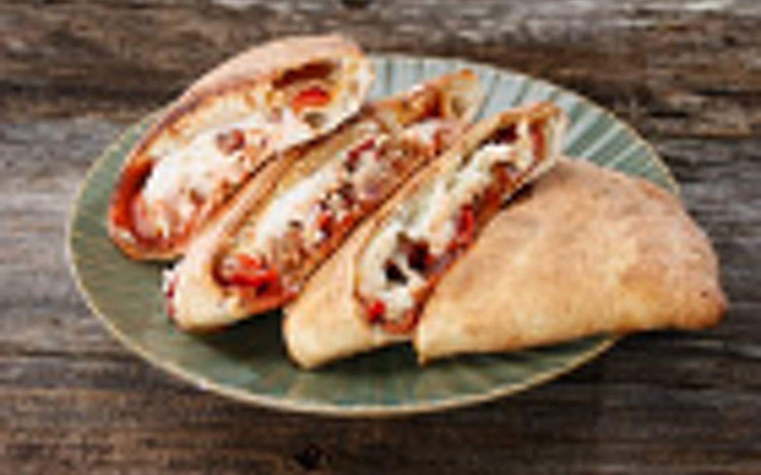 Order Big Wednesday Calzone food online from Extreme Pizza store, Alamo on bringmethat.com
