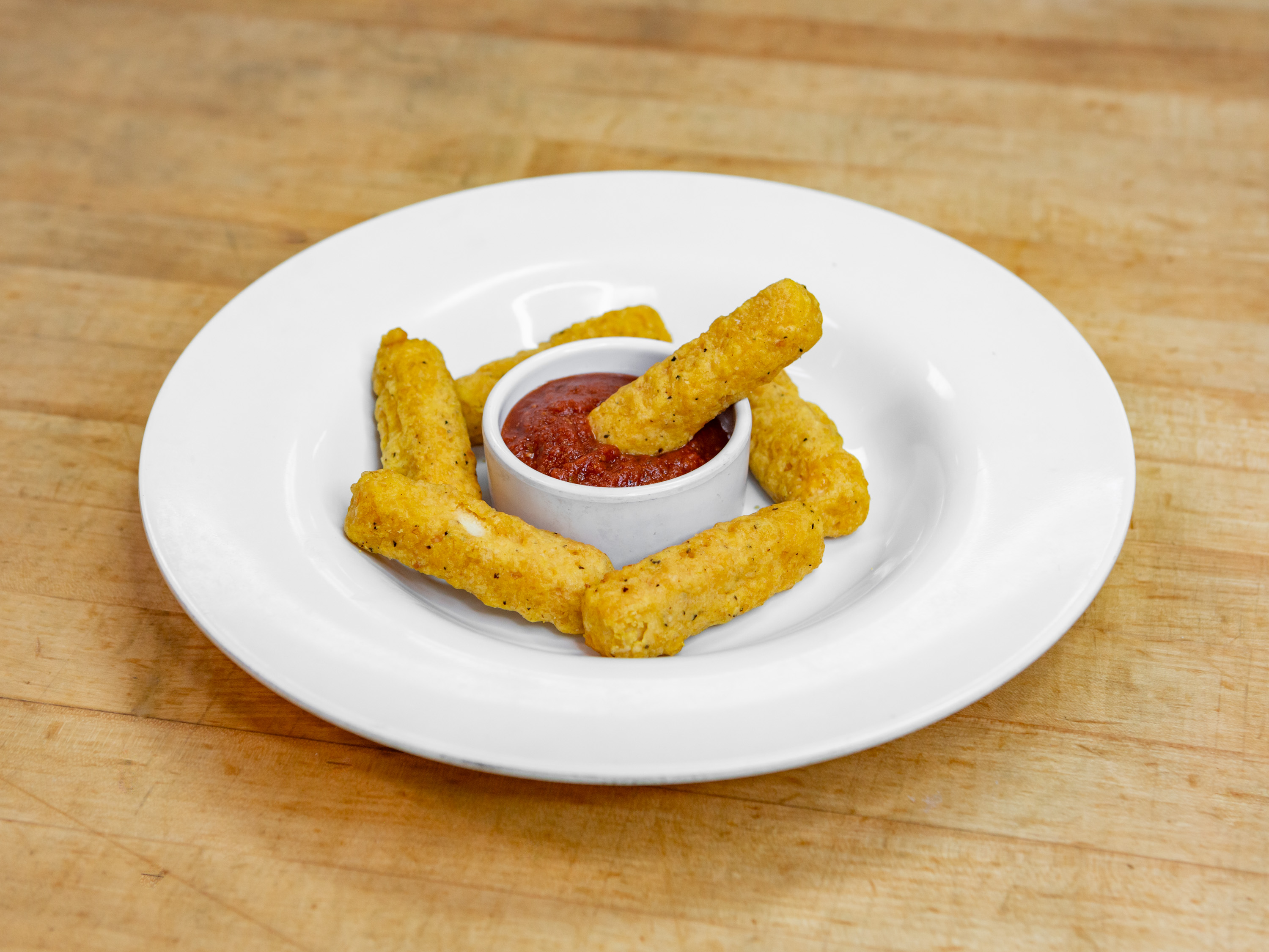 Order Deep Fried Mozzarella Sticks food online from Guidos Pizza store, Anchorage on bringmethat.com
