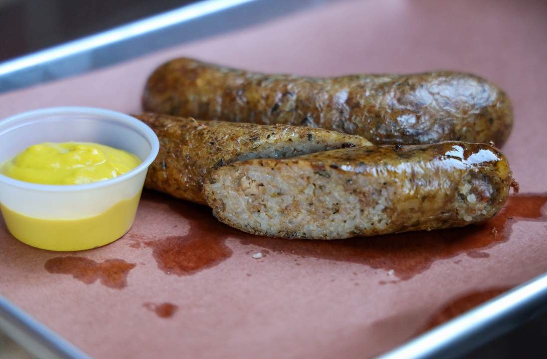 Order 1/2lb Smoked Boudin food online from Blu's Barbeque & Bbq Catering store, Dallas on bringmethat.com