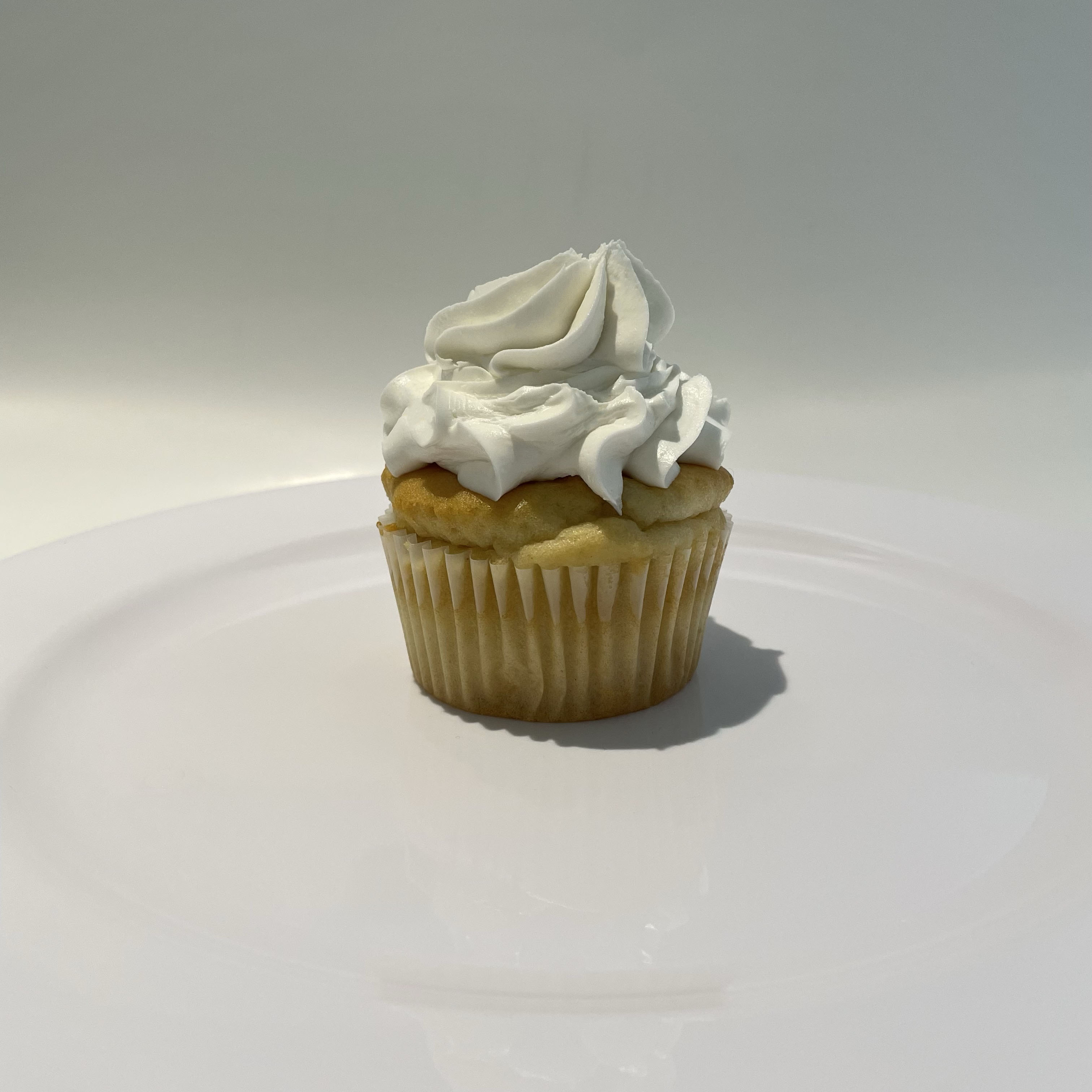 Order Vegan Vanilla Riot Cupcake food online from The House of Cupcakes store, Princeton on bringmethat.com