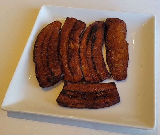 Order Fried Plantain food online from Paradise Place Jamaican Cuisine store, Las Vegas on bringmethat.com