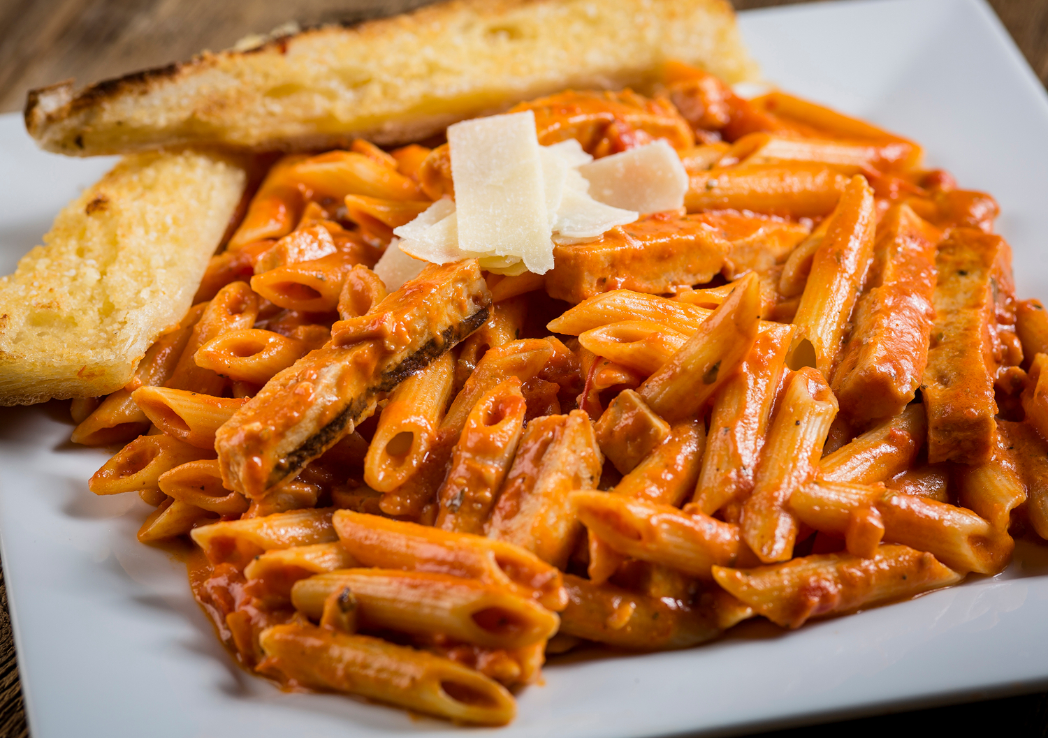 Order Penne and Grilled Chicken a la Vodka food online from Rosati's Pizza store, Braidwood on bringmethat.com
