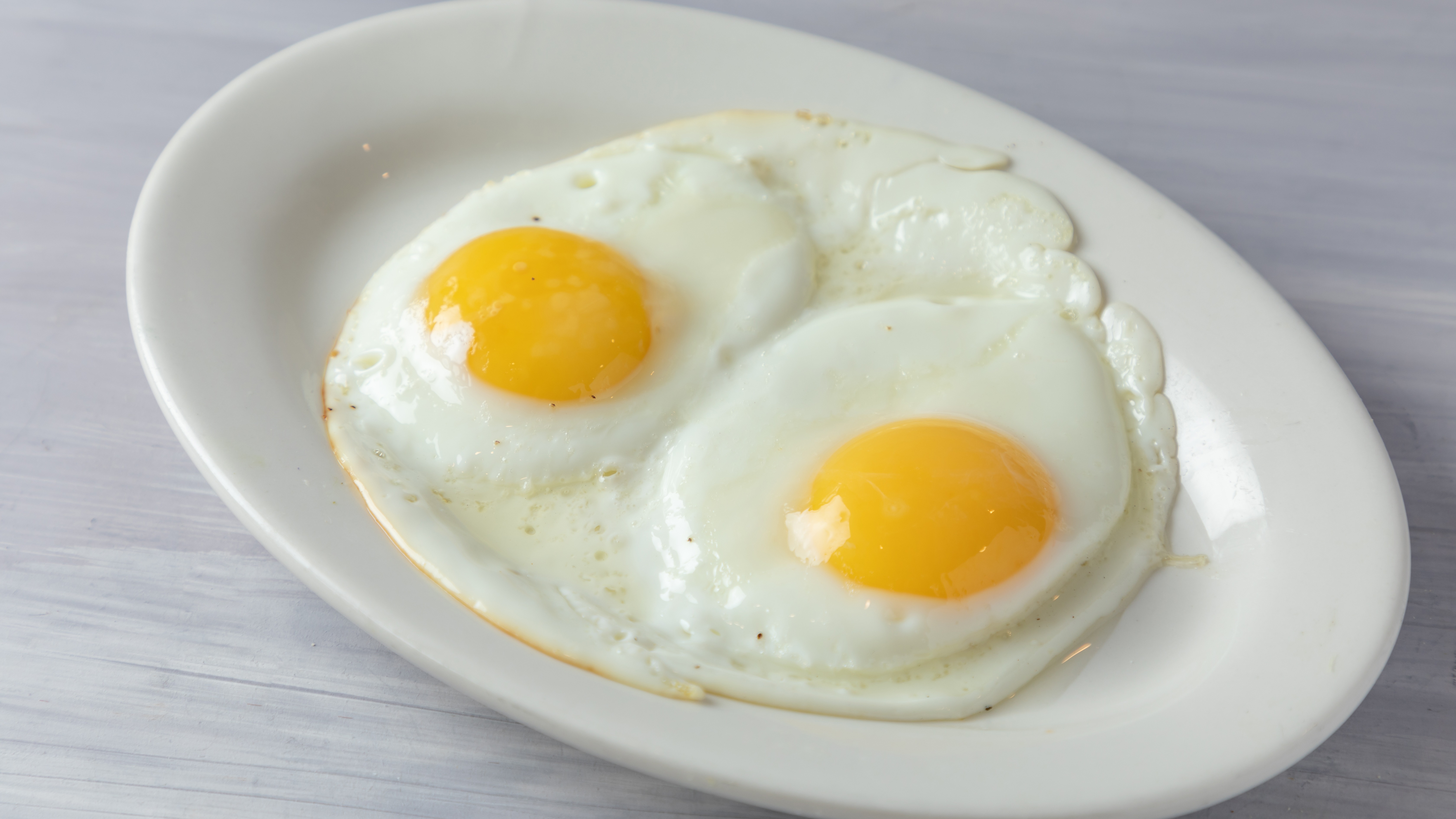 Order 2 Eggs Any Style food online from Chango Kitchen store, Hoboken on bringmethat.com