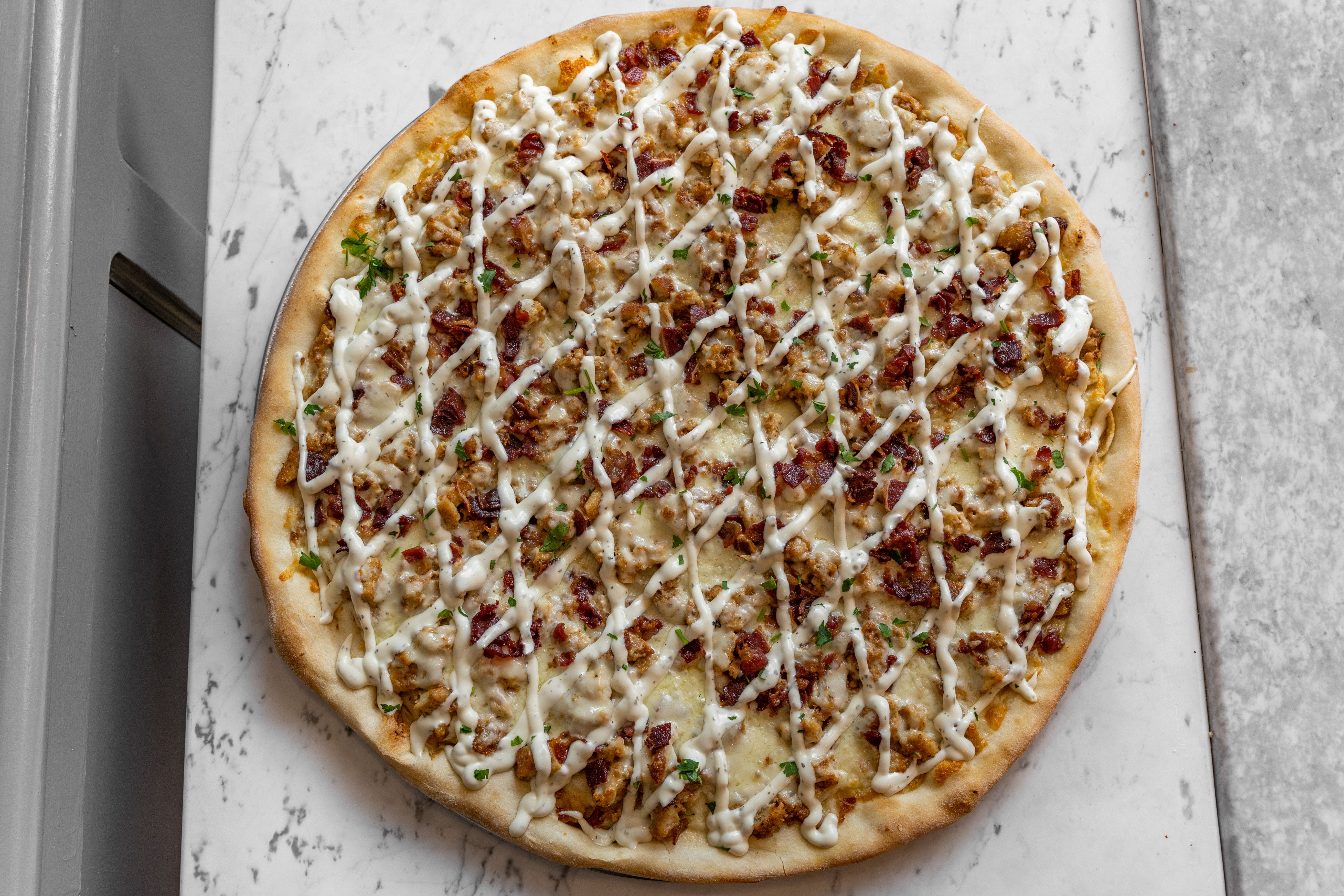 Order Chicken Bacon Ranch Pizza - Medium 14" food online from Roma's pizza store, New York on bringmethat.com