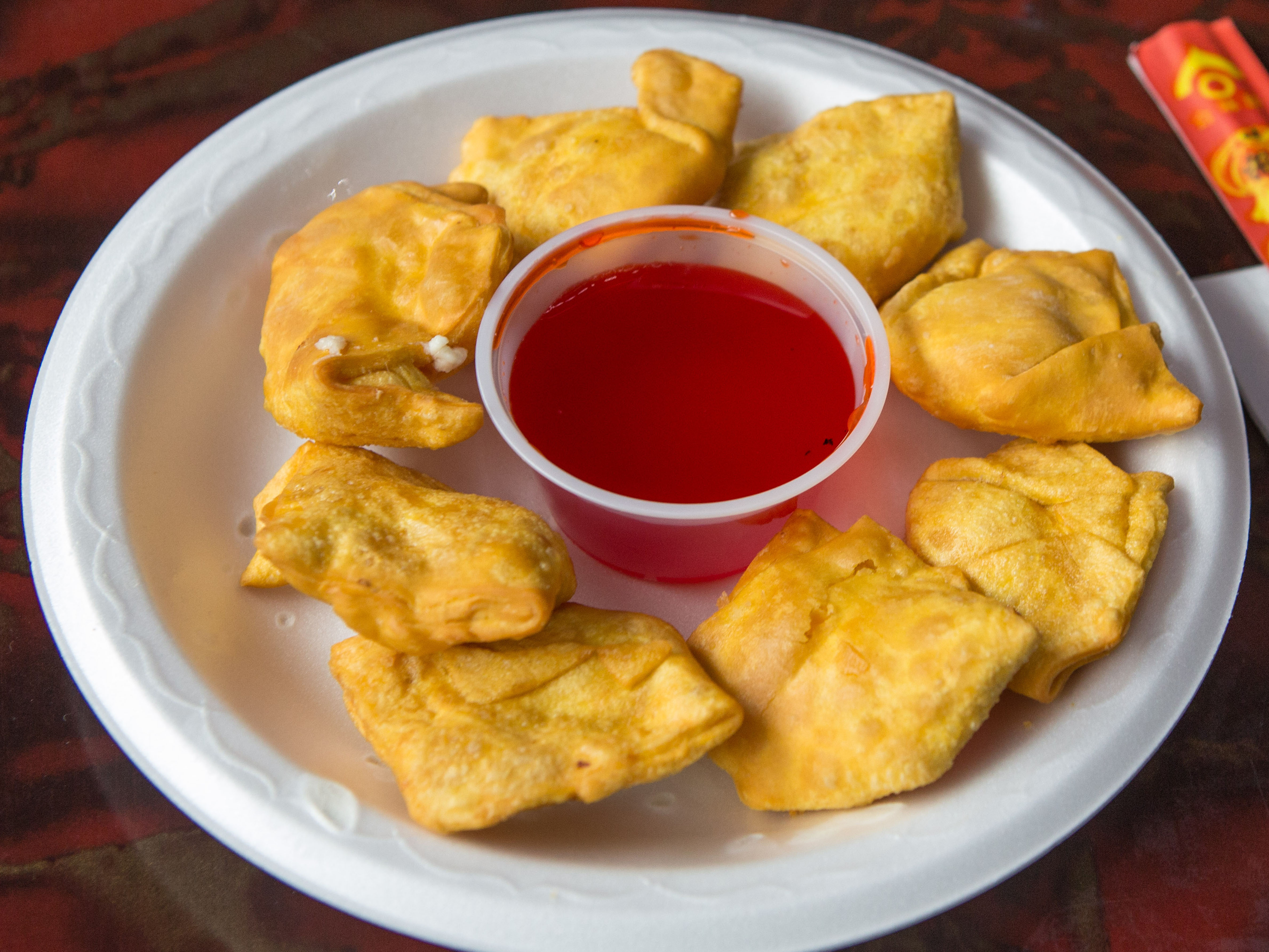Order 12. 8 Piece Fried Crab Rangoon food online from New Asia store, New York on bringmethat.com