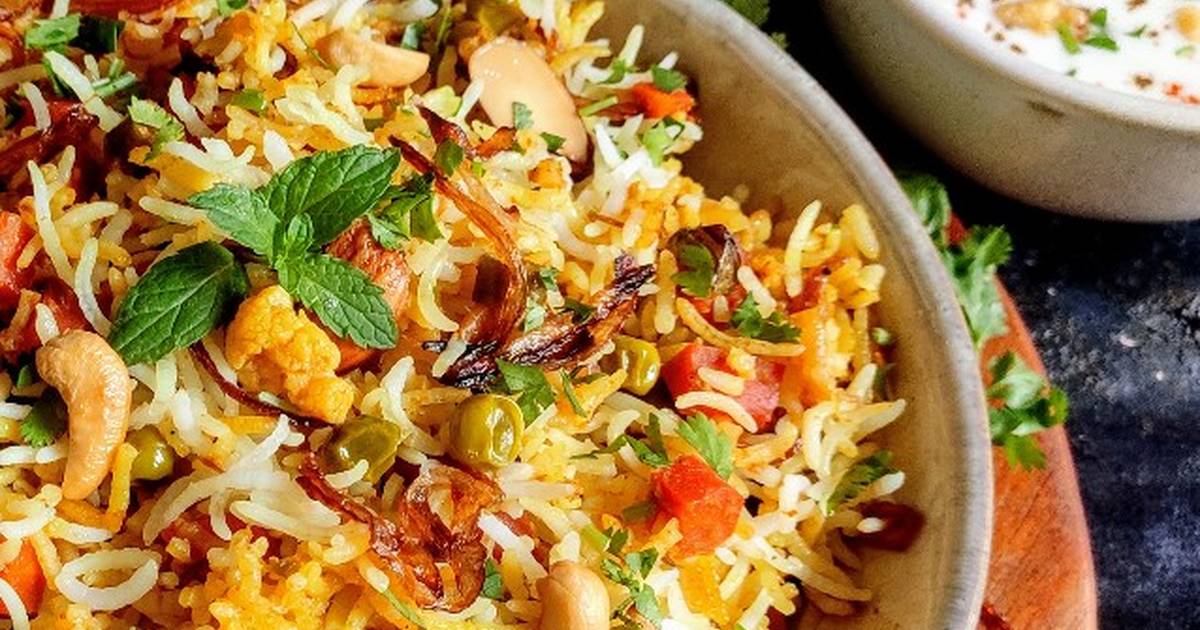 Order Veg Biryani food online from Cosmo Indian Cafe store, Lawrence on bringmethat.com