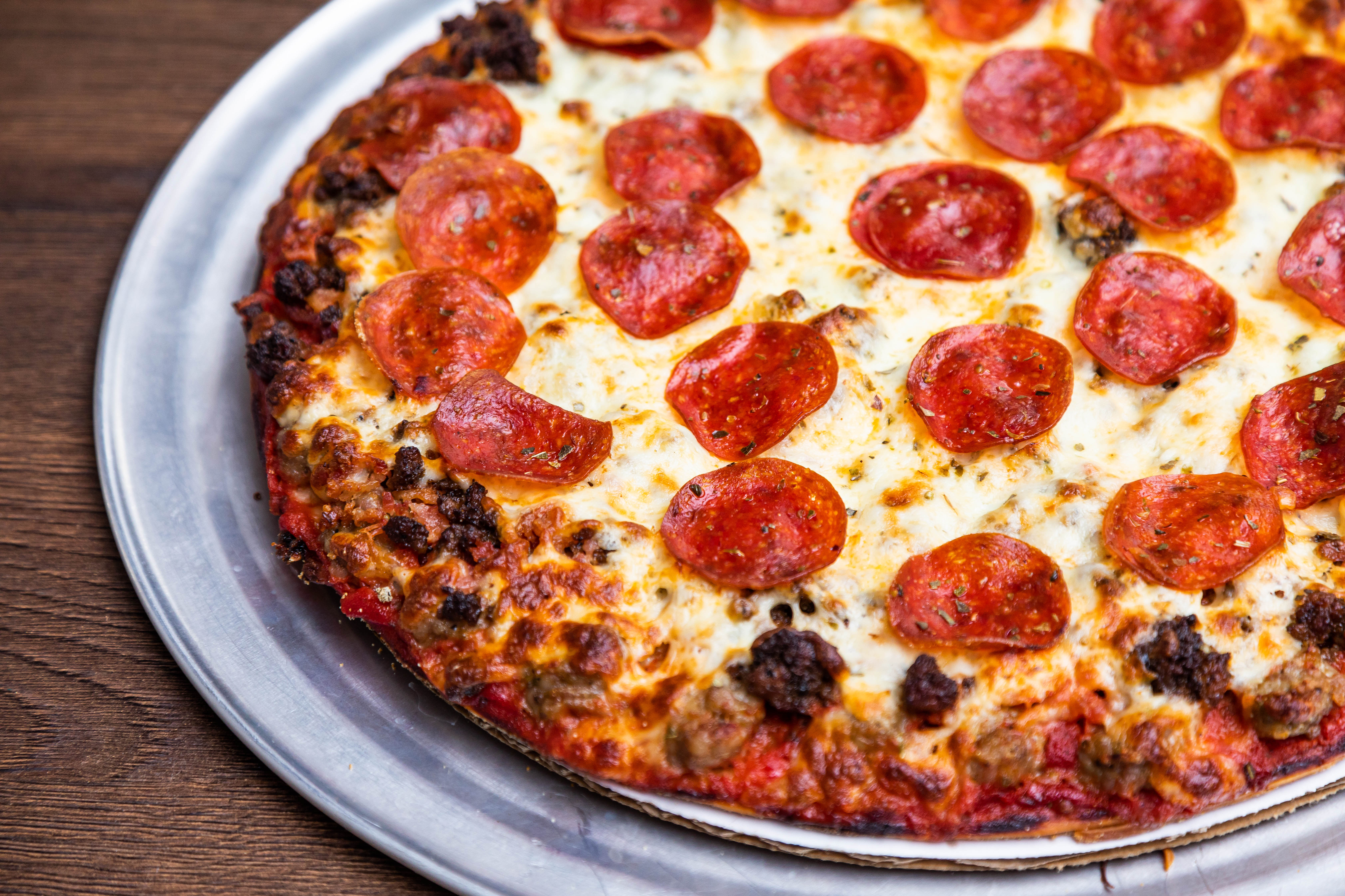 Order Thin Crust Meat Lovers food online from Zazzo'S Pizza store, Westmont on bringmethat.com
