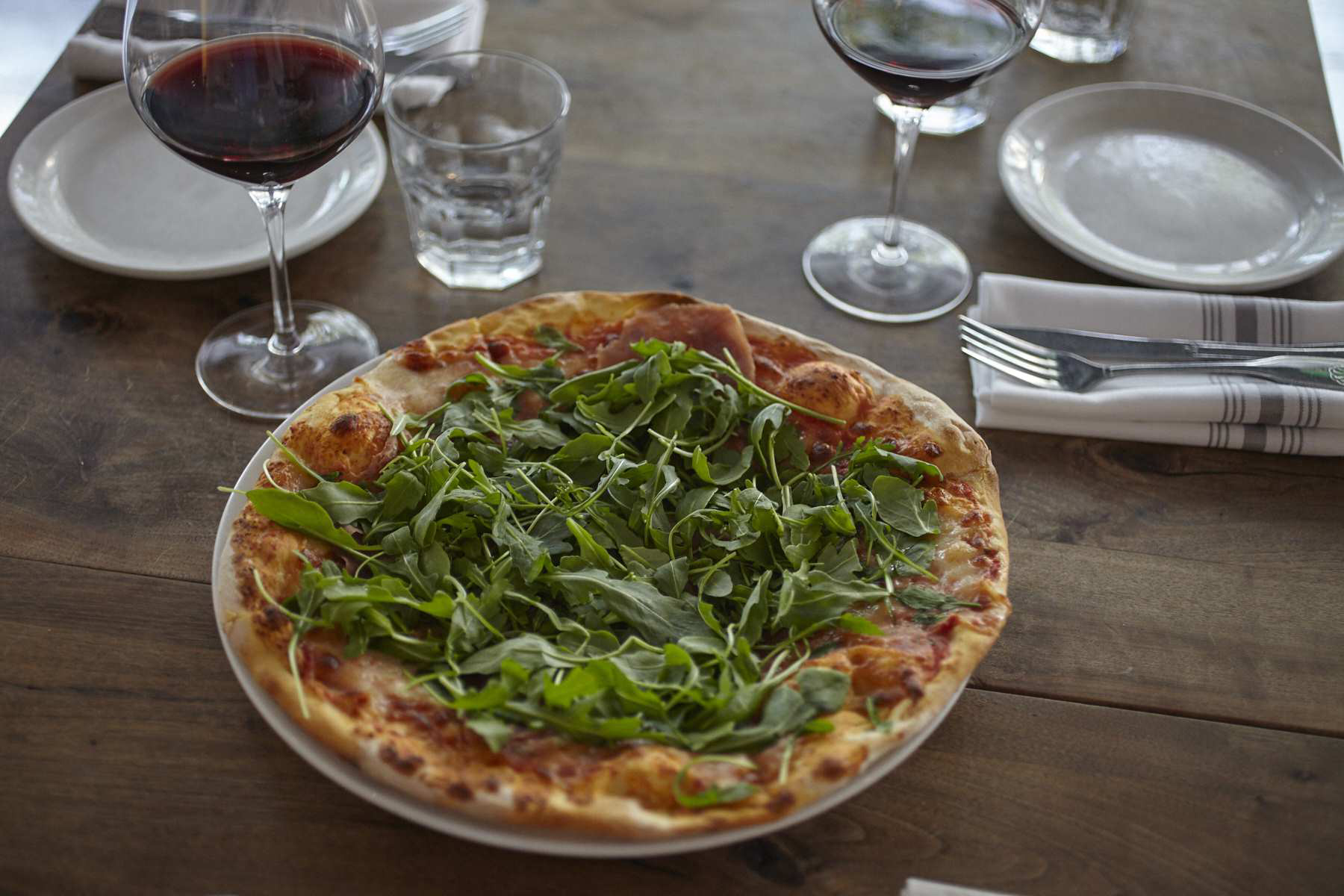 Order Prosciutto e Rucola Pizza food online from Pazzia Restaurant & Pizzeria store, San Francisco on bringmethat.com