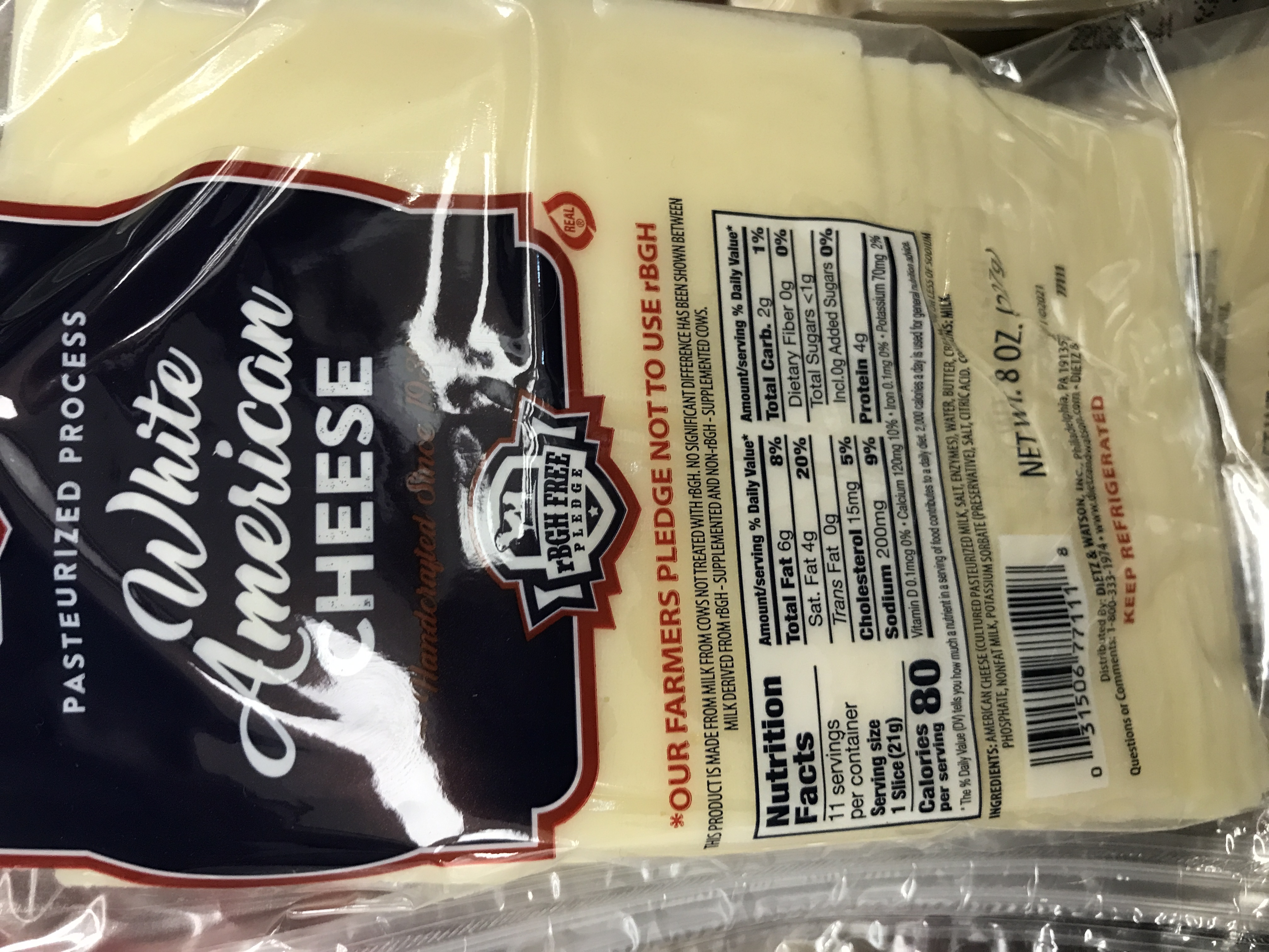 Order Sliced White American Cheese D&W 8oz food online from The Ice Cream Shop store, Providence on bringmethat.com