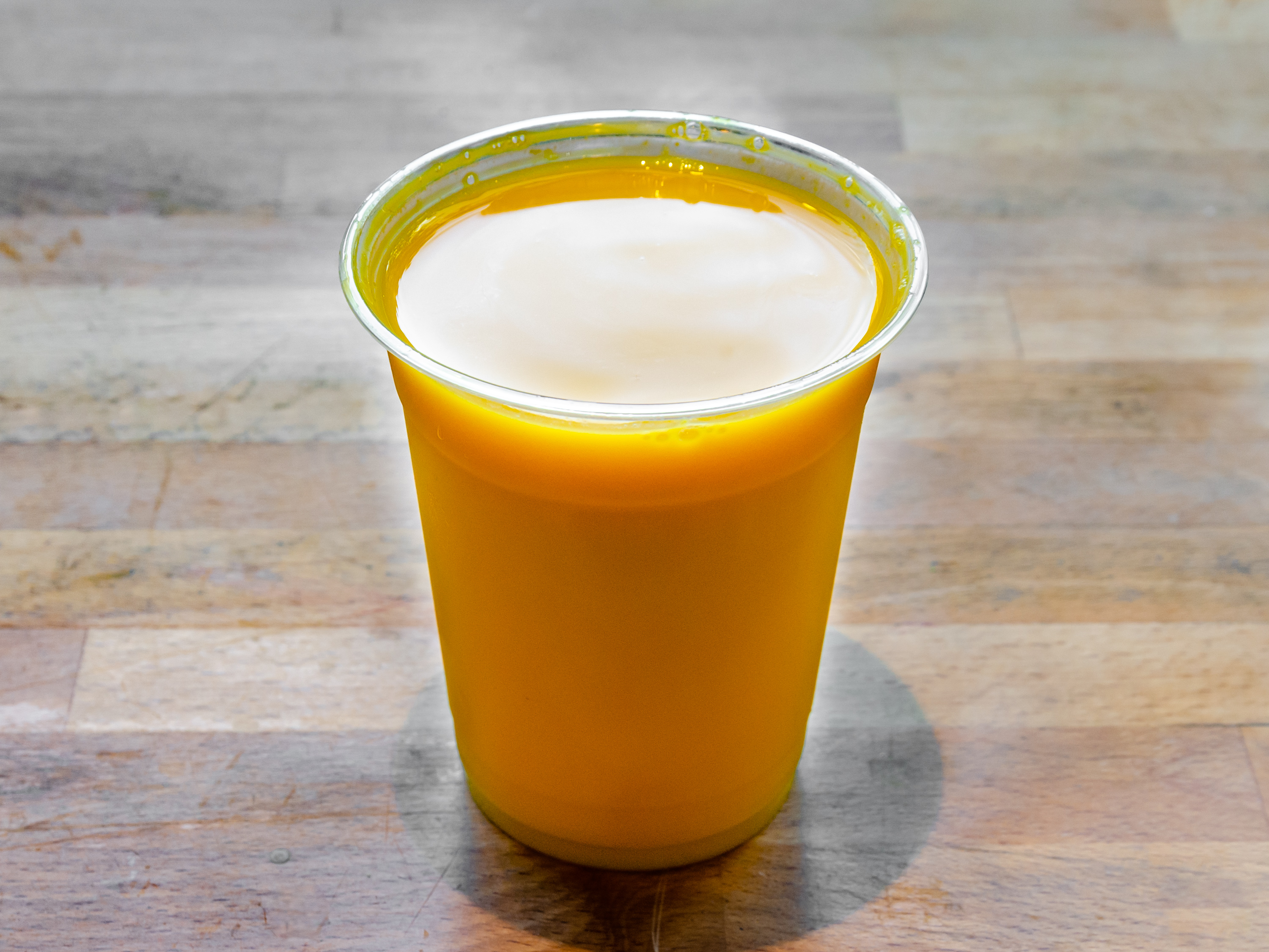 Order Mango Lassi food online from Chapati House store, New York on bringmethat.com