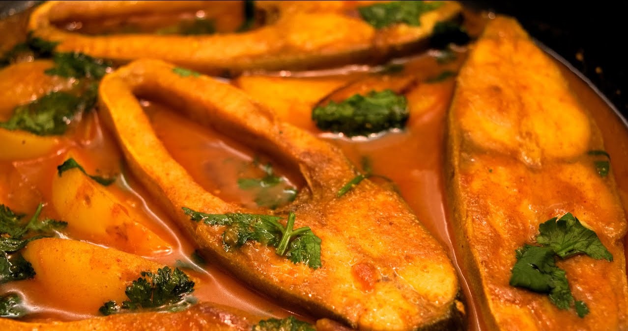 Order Pomfret Fish Curry food online from Ruchi Indian Restaurant store, Bellevue on bringmethat.com