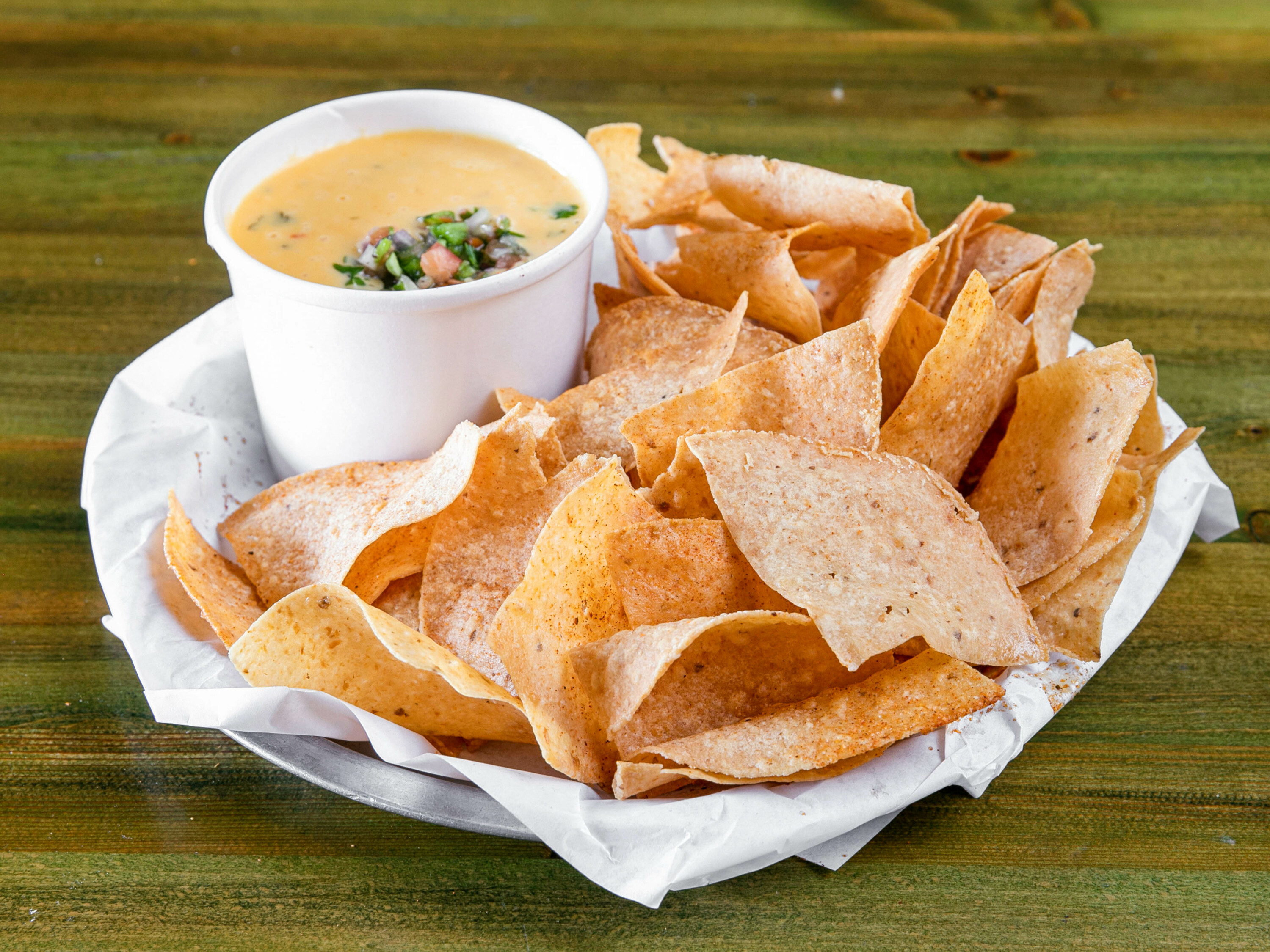 Order Chips and Queso food online from Uncle Uber's Sammich Shop store, Dallas on bringmethat.com