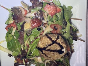Order Strawberry & Walnut Salad Encrusted Goat Cheese food online from Bistro 1051 store, Clark on bringmethat.com